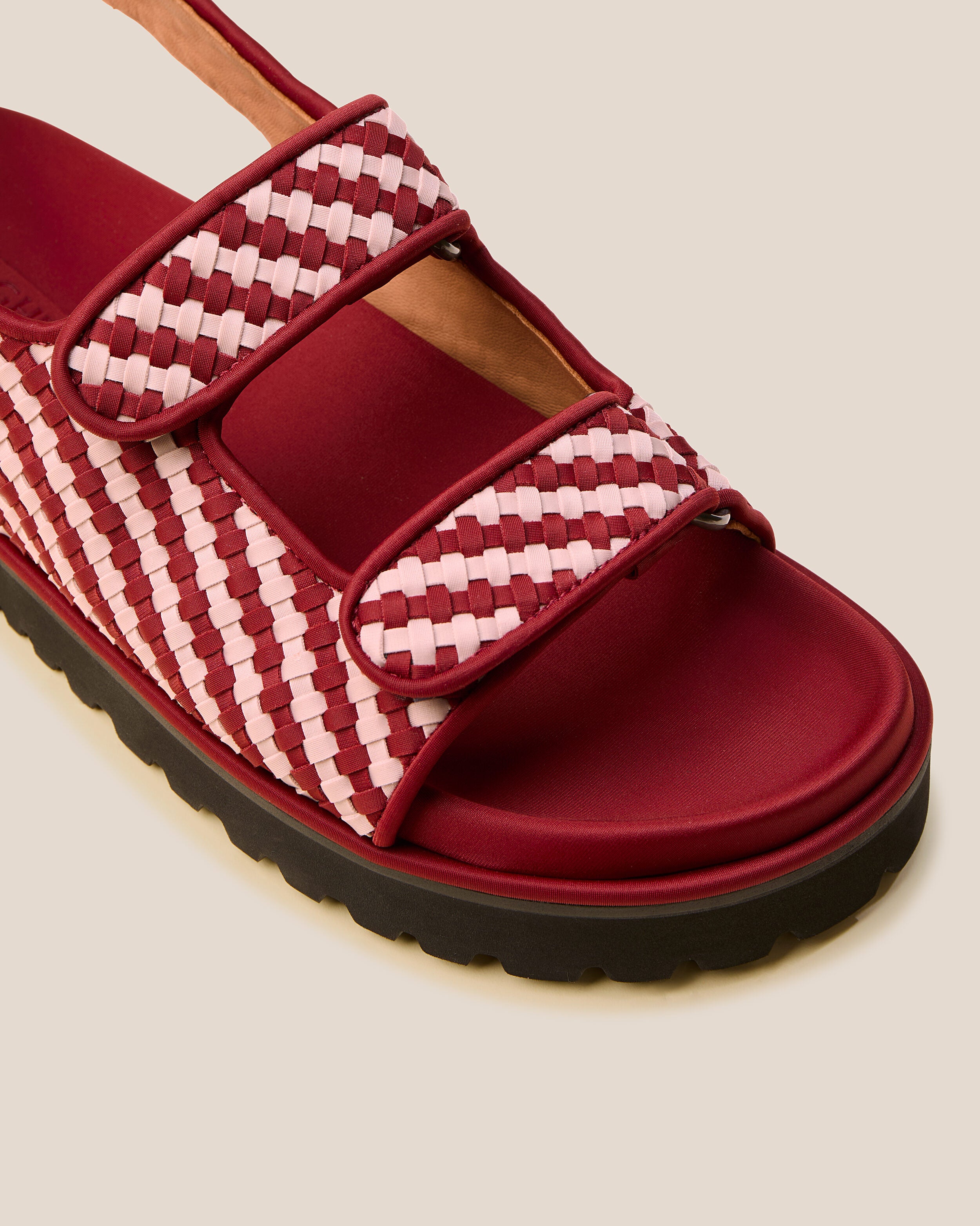 Close-up of The Catalina Sandal in Lychee showing its open toe and square silhouette.