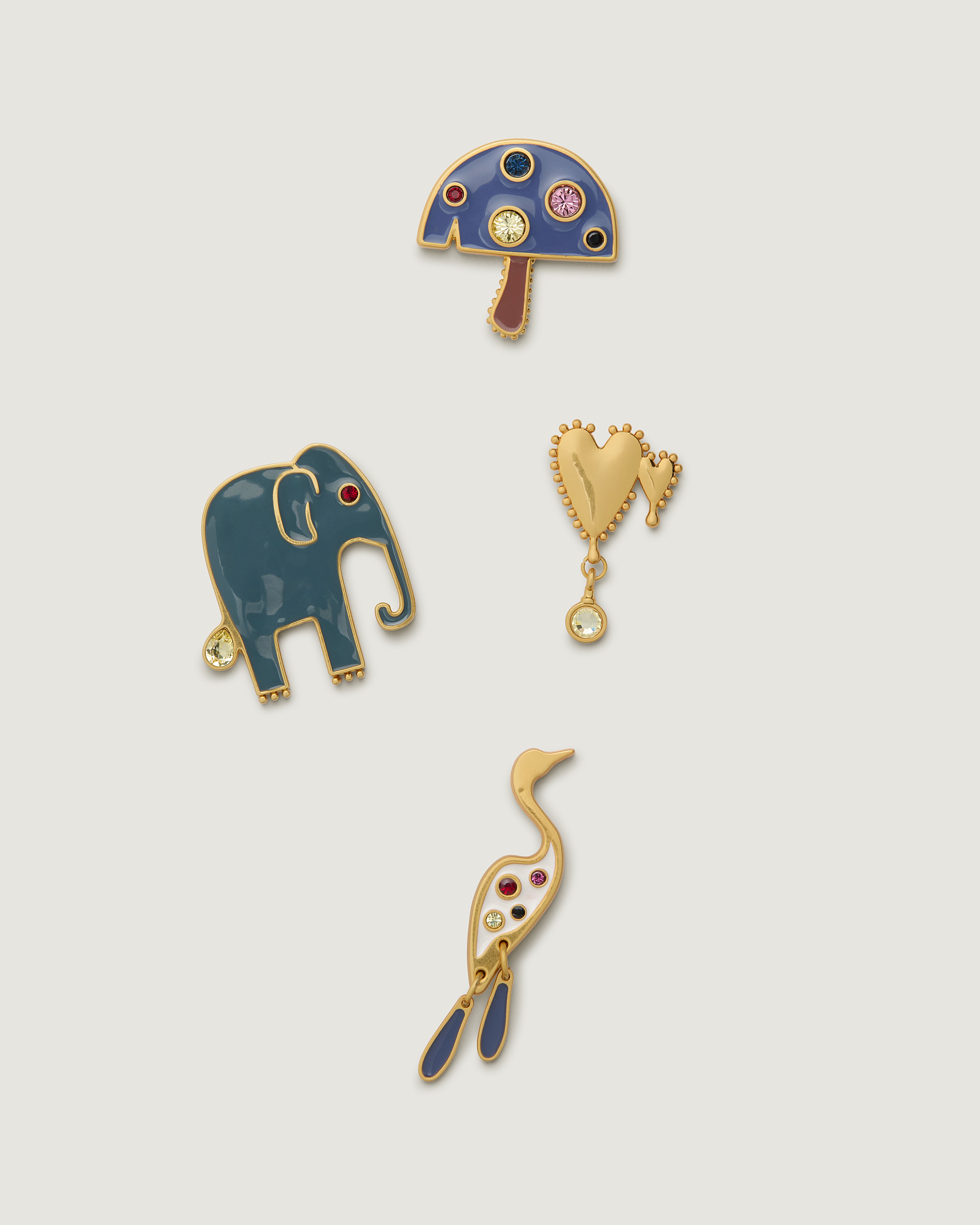 Group shot of 4 icon bag charms.