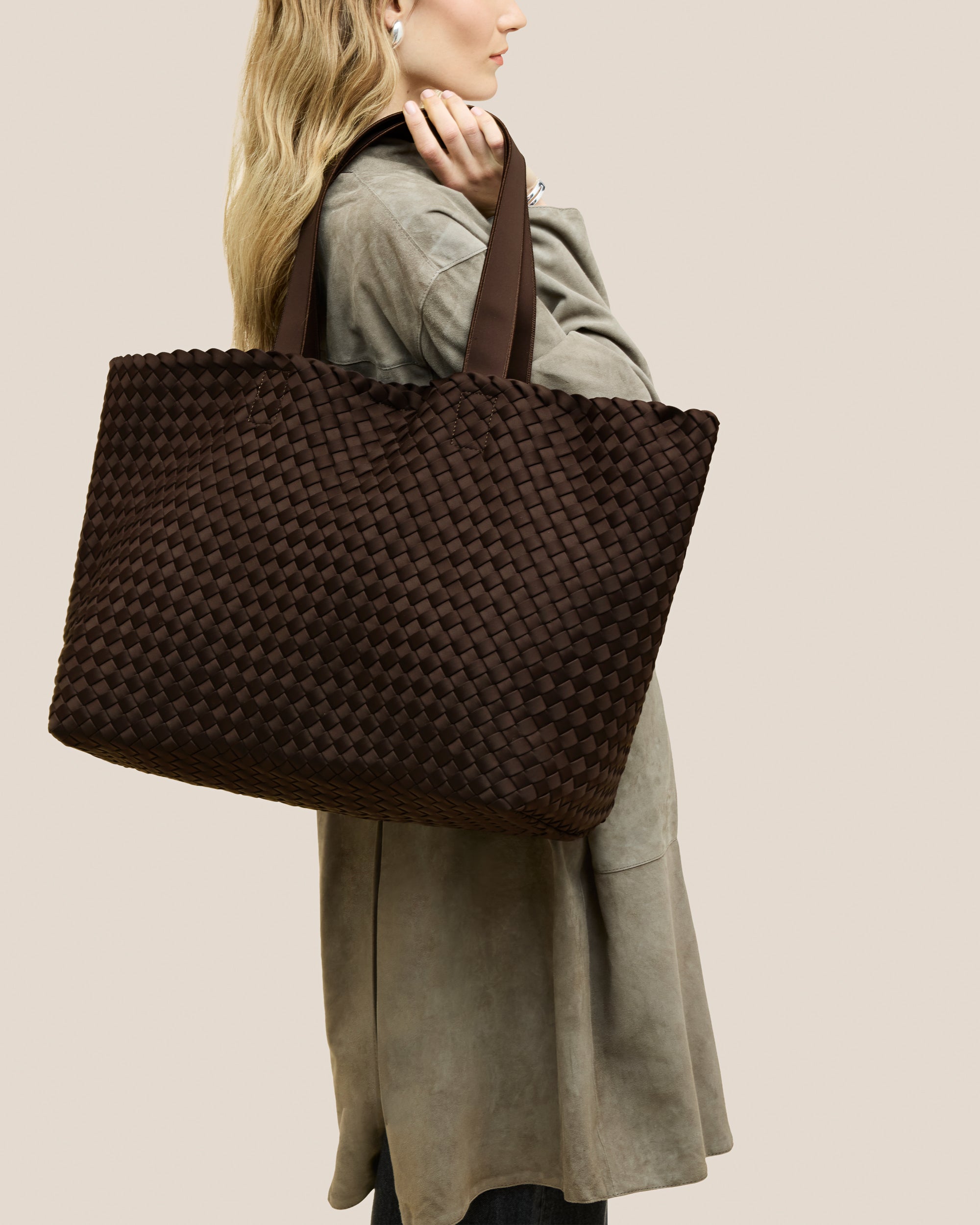 Como Large Tote Bag in Chocolate shown on model to illustrate scale and soft silhouette.