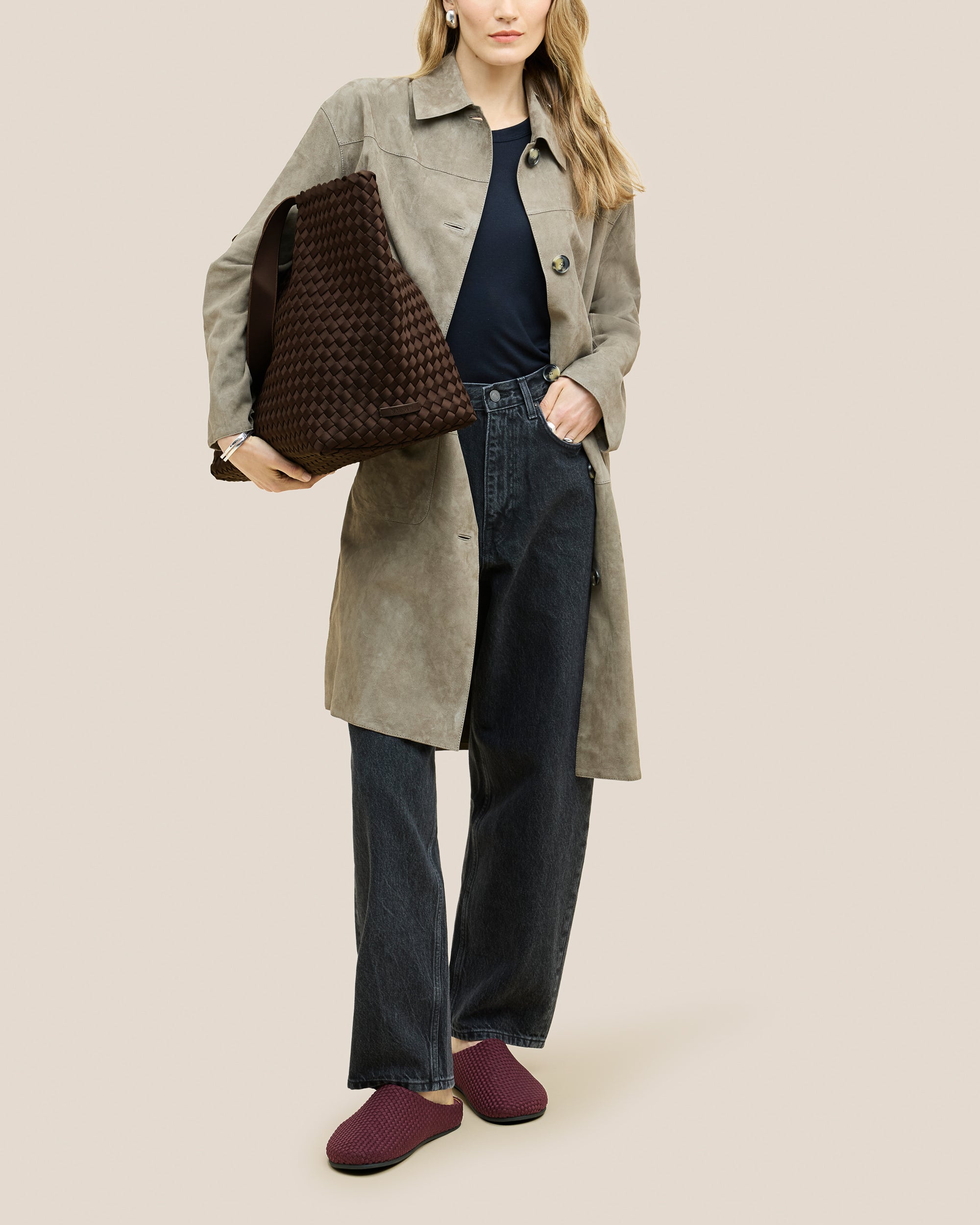 Como Large Tote Bag in Chocolate shown on model to illustrate scale and soft silhouette.