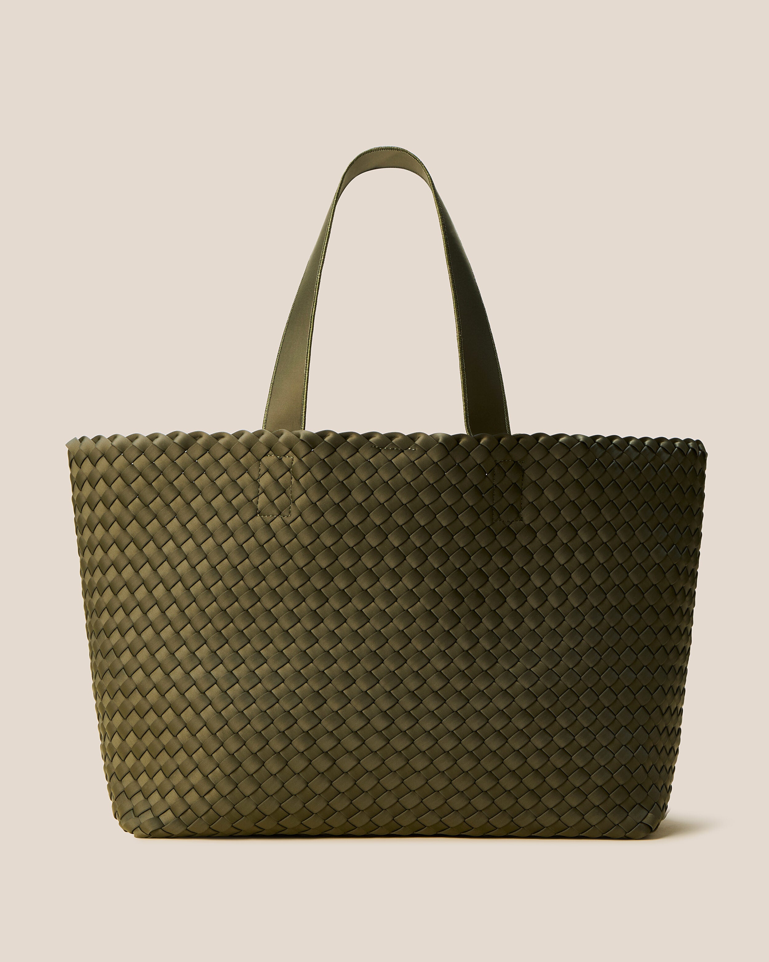 Como Tote in Olive, an olive green tone, in handwoven neoprene, featuring an open top with magnetic snap closure, and neoprene shoulder straps.