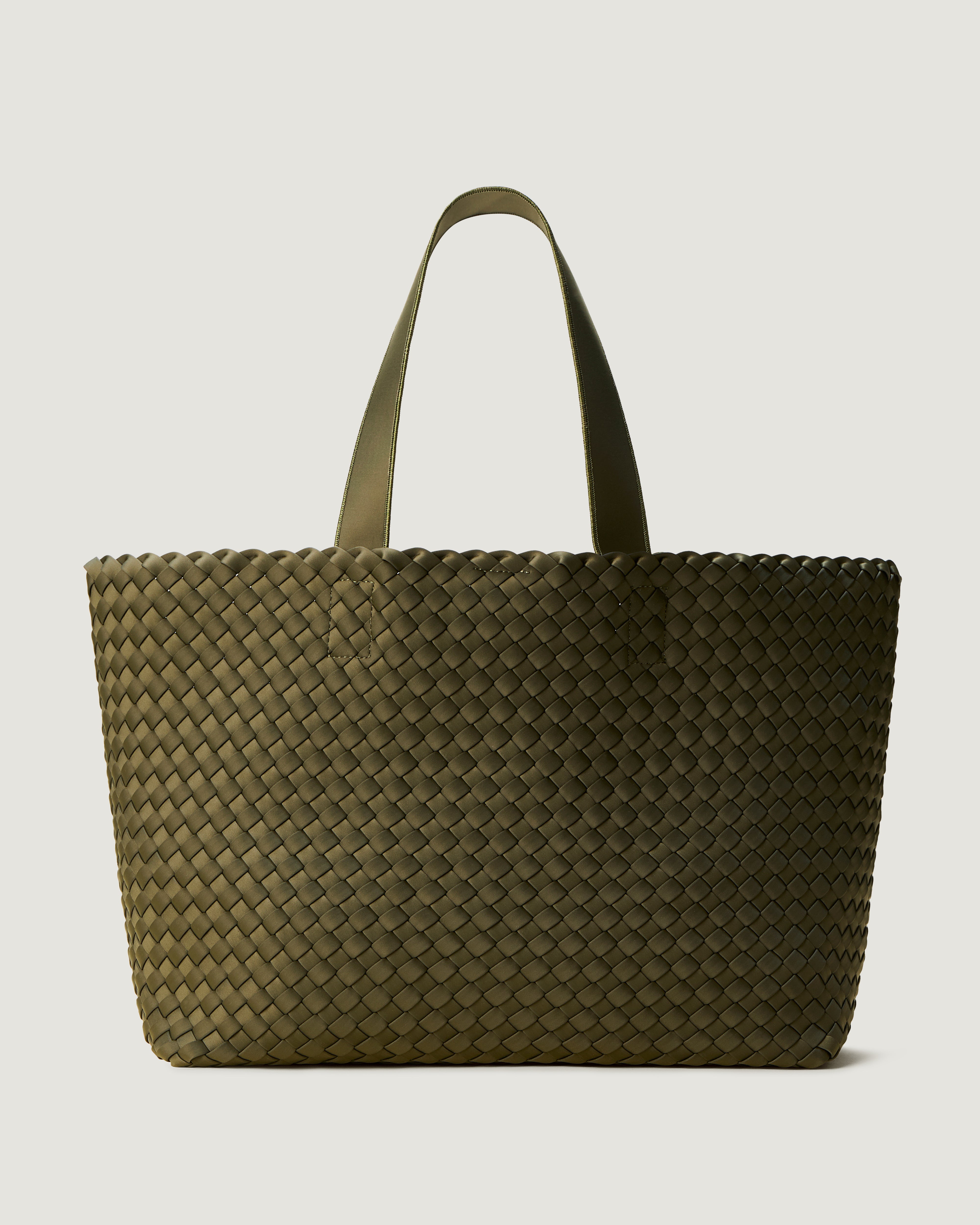 Como Tote in Olive, an olive green tone, in handwoven neoprene, featuring an open top with magnetic snap closure, and neoprene shoulder straps.