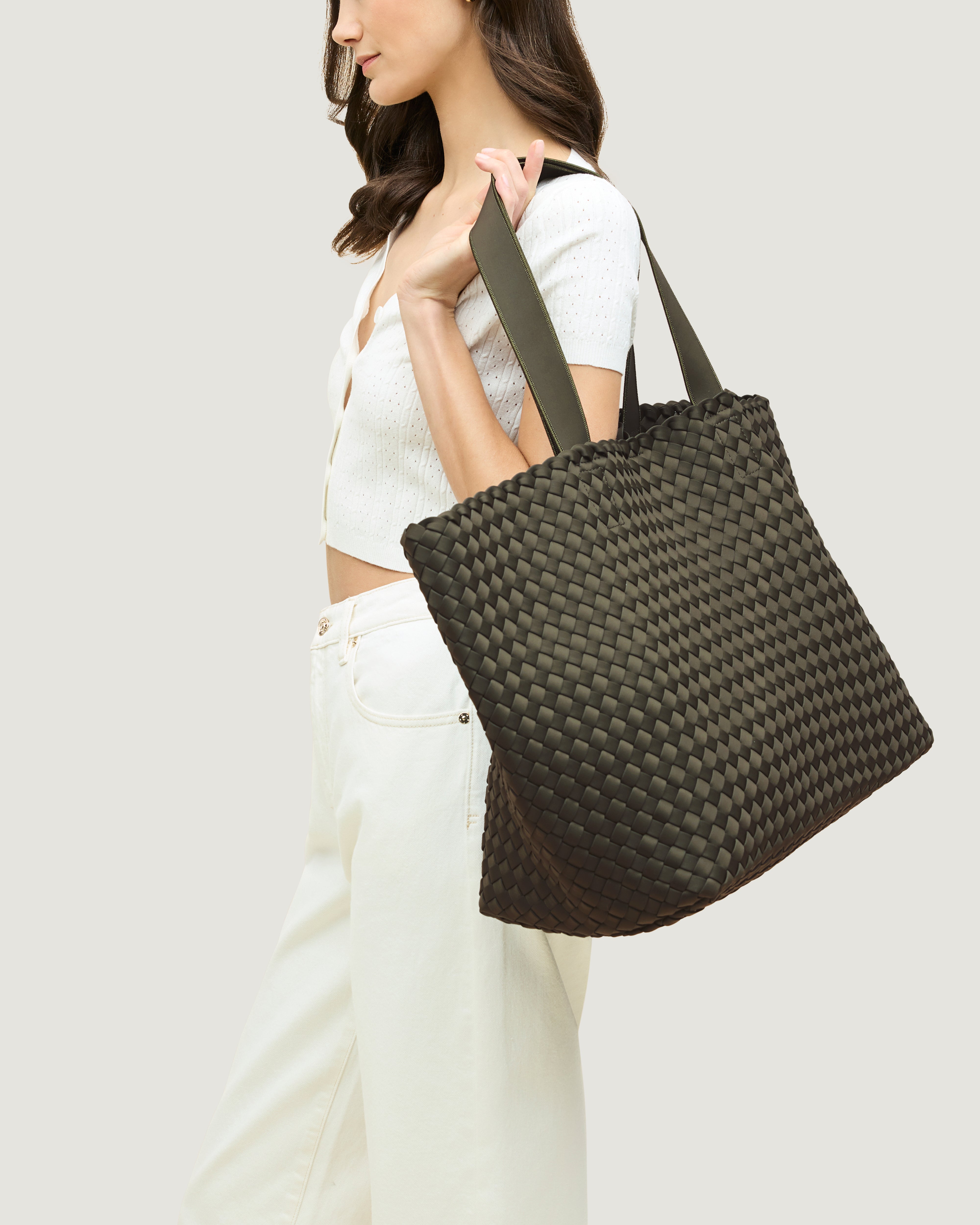 Como Tote in Olive shown on model to illustrate scale and soft silhouette.