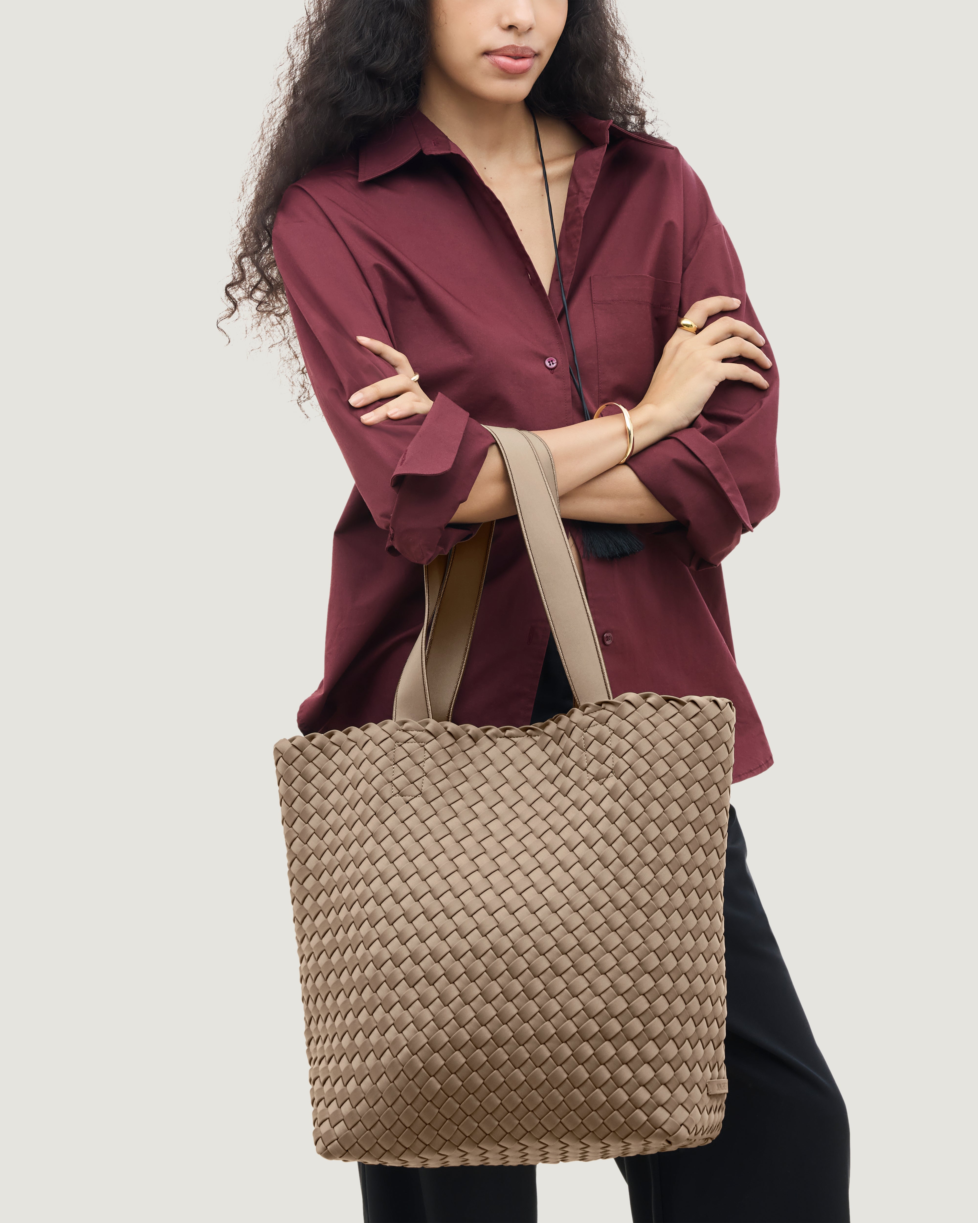 Como Tote in Cashmere shown on model to illustrate scale and soft silhouette.