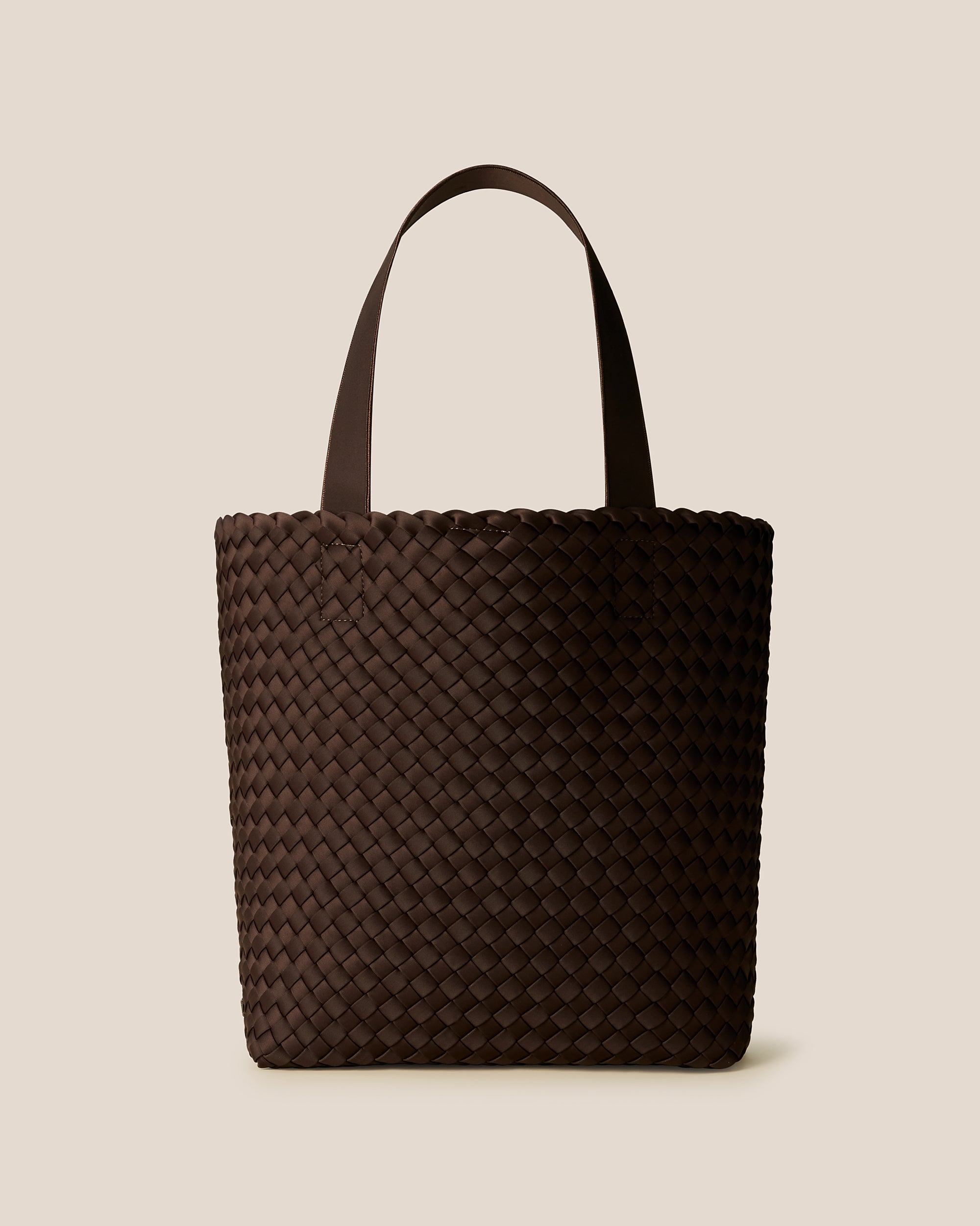 Como Shopper Tote Bag in Chocolate, a dark chocolate brown tone, in handwoven neoprene featuring an open top with magnetic snap closure, and neoprene shoulder straps.