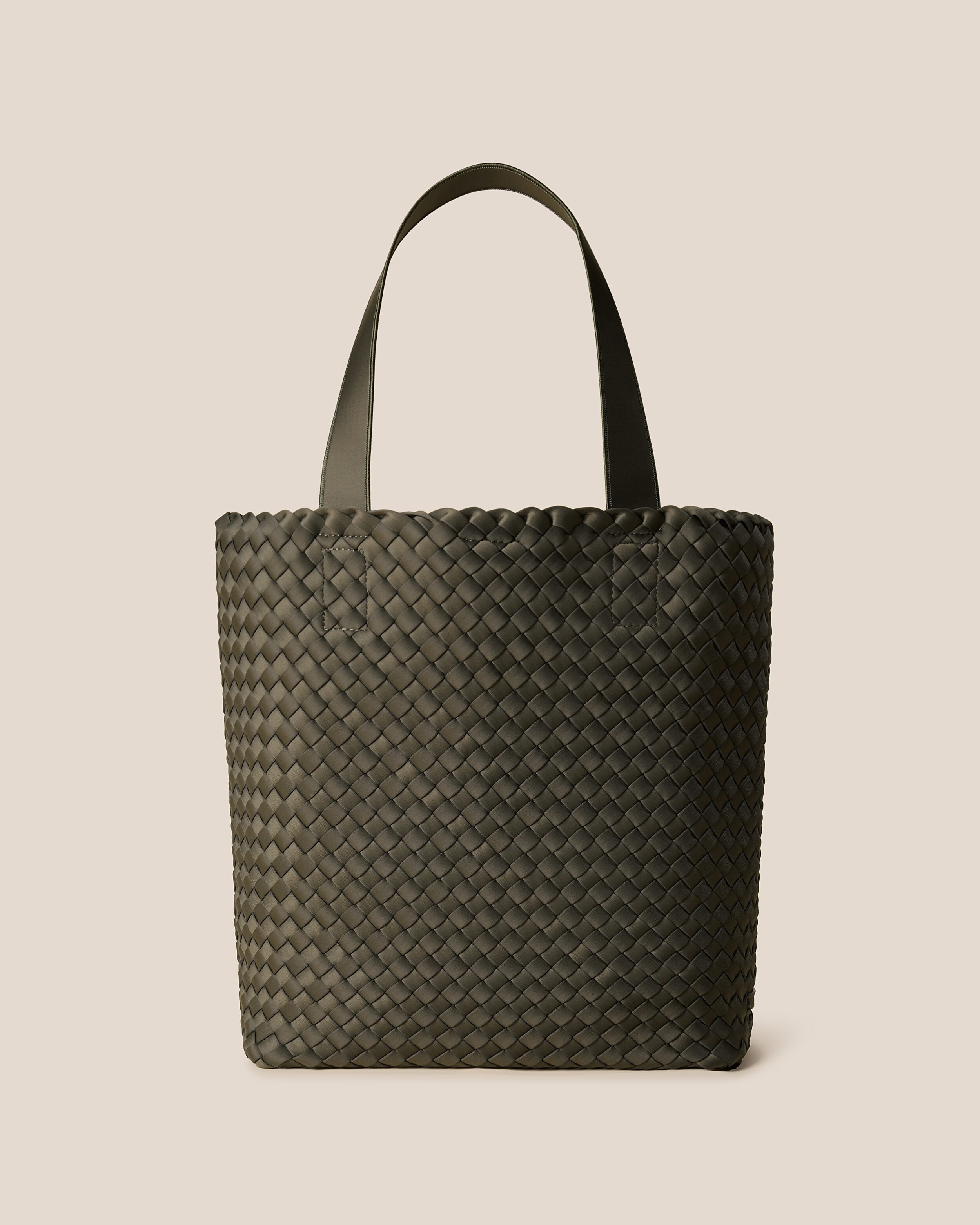 Como Tote in Olive, an olive green tone, in handwoven neoprene, featuring an open top with magnetic snap closure, and neoprene shoulder straps.