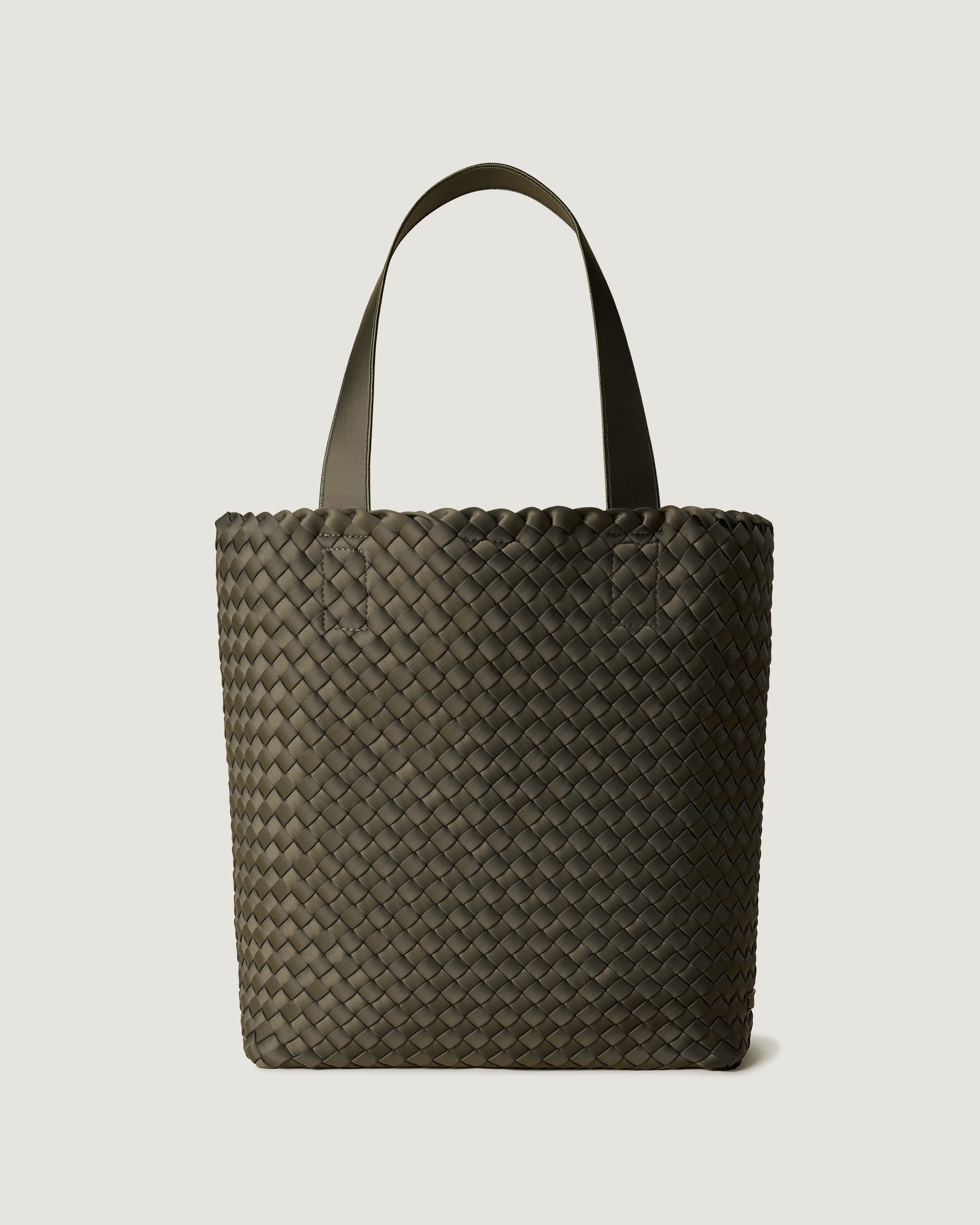 Como Tote in Olive, an olive green tone, in handwoven neoprene, featuring an open top with magnetic snap closure, and neoprene shoulder straps.