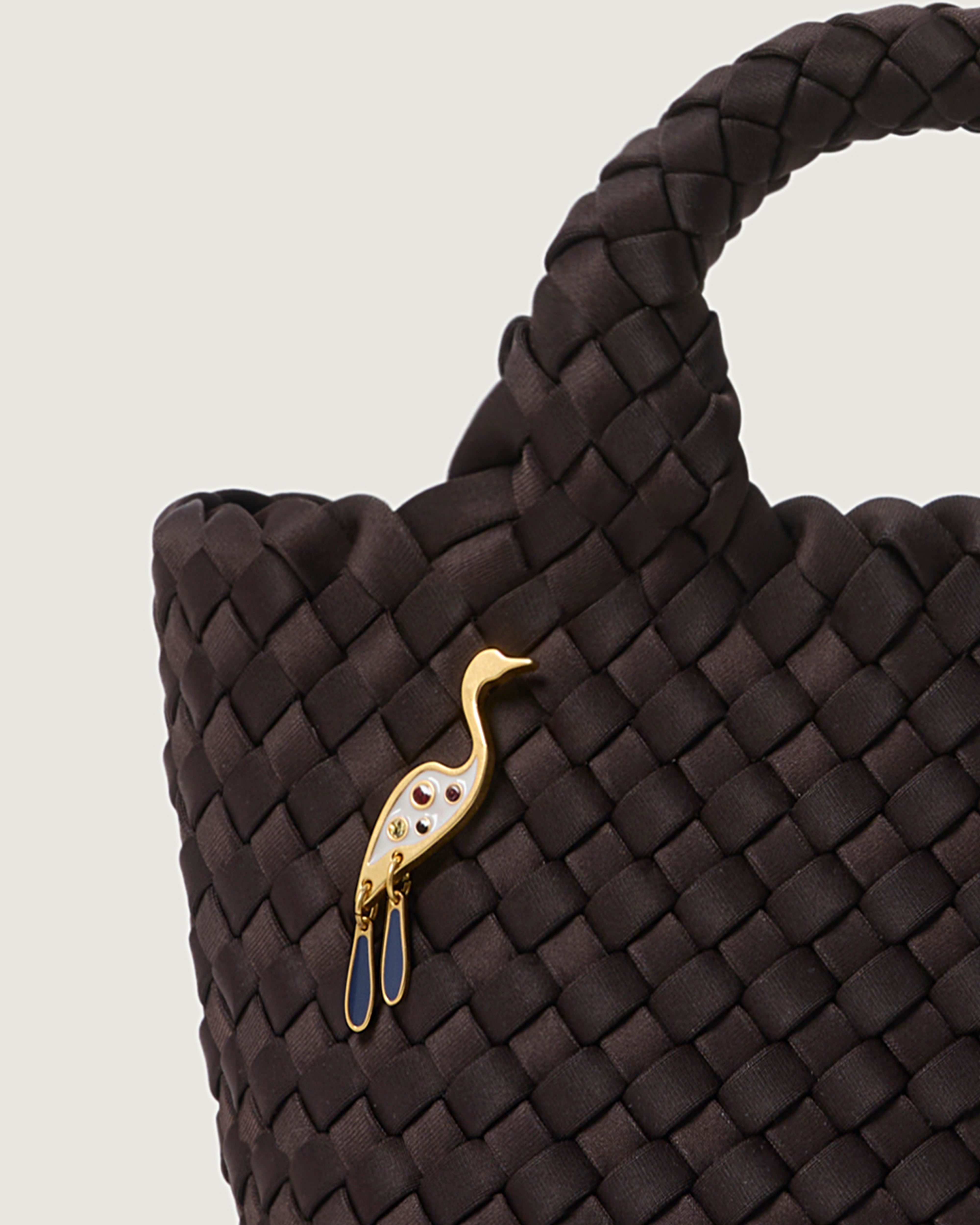Bird of Paradise Bag Charm shown on St. Barths Petit Tote highlighting the size and scale.
