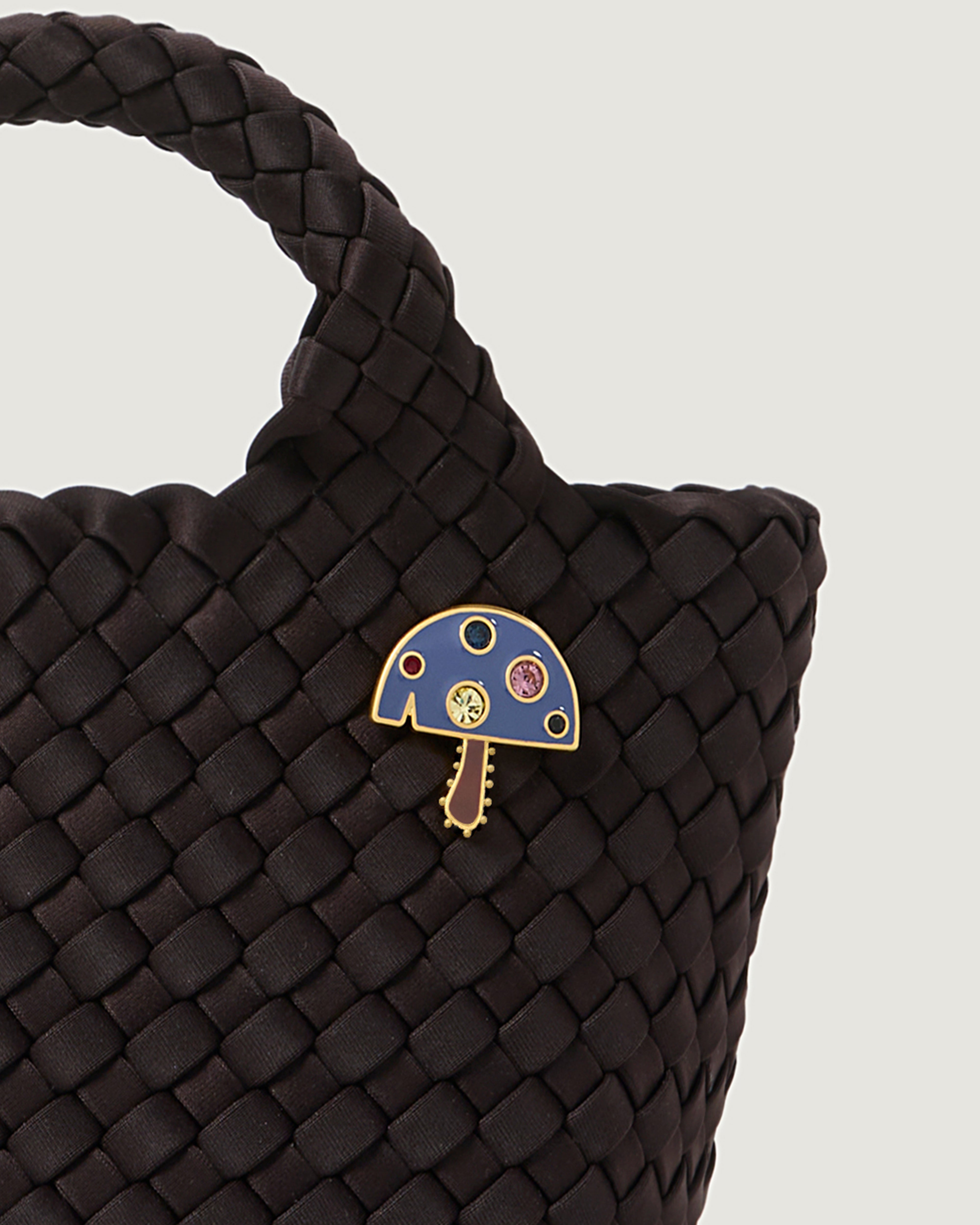 Magic Mushroom Bag Charm shown on St. Barths Petit Tote highlighting the size and scale.