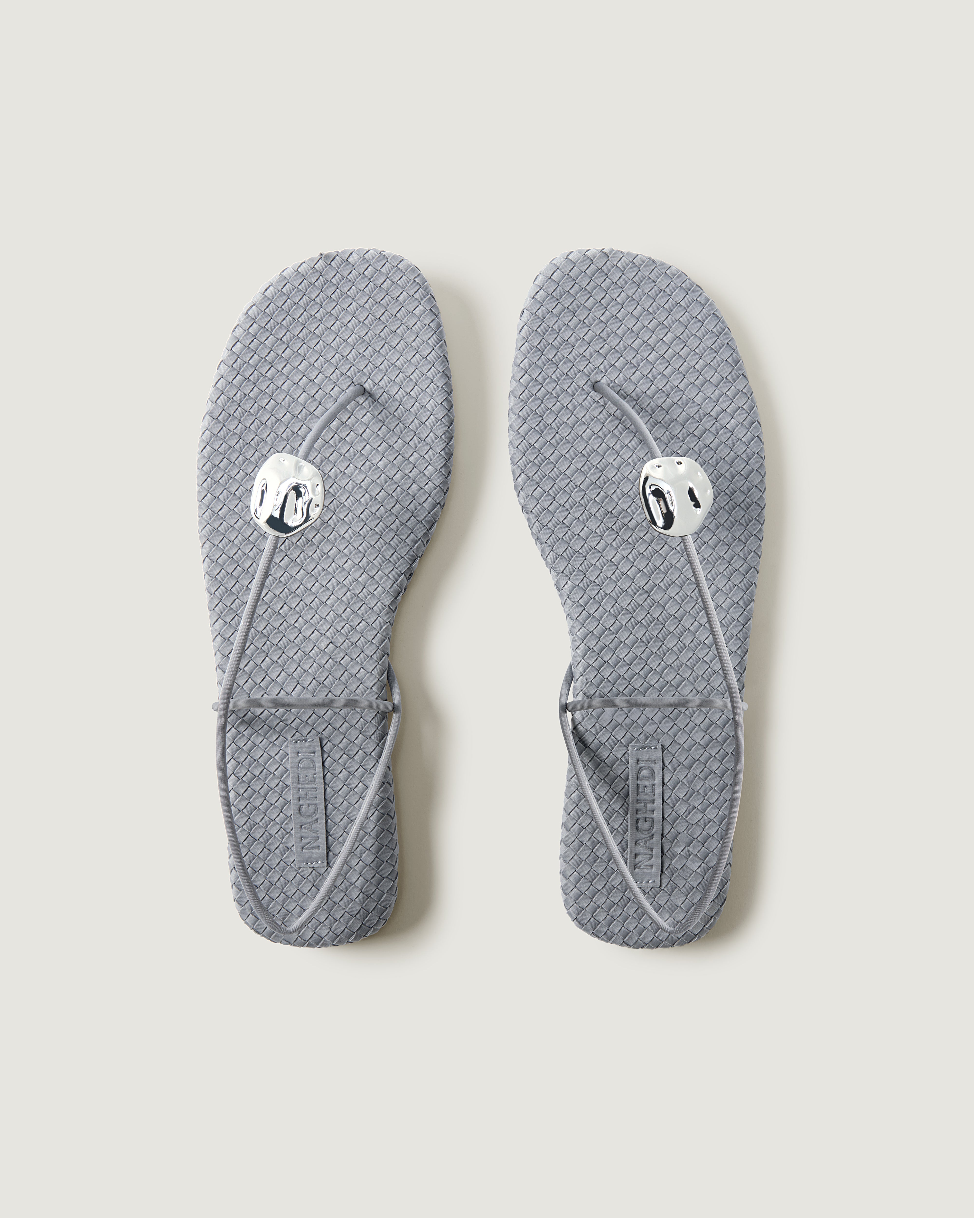 Top view of pair of The Gaia Sandal in Marina showing the handwoven neoprene insole.