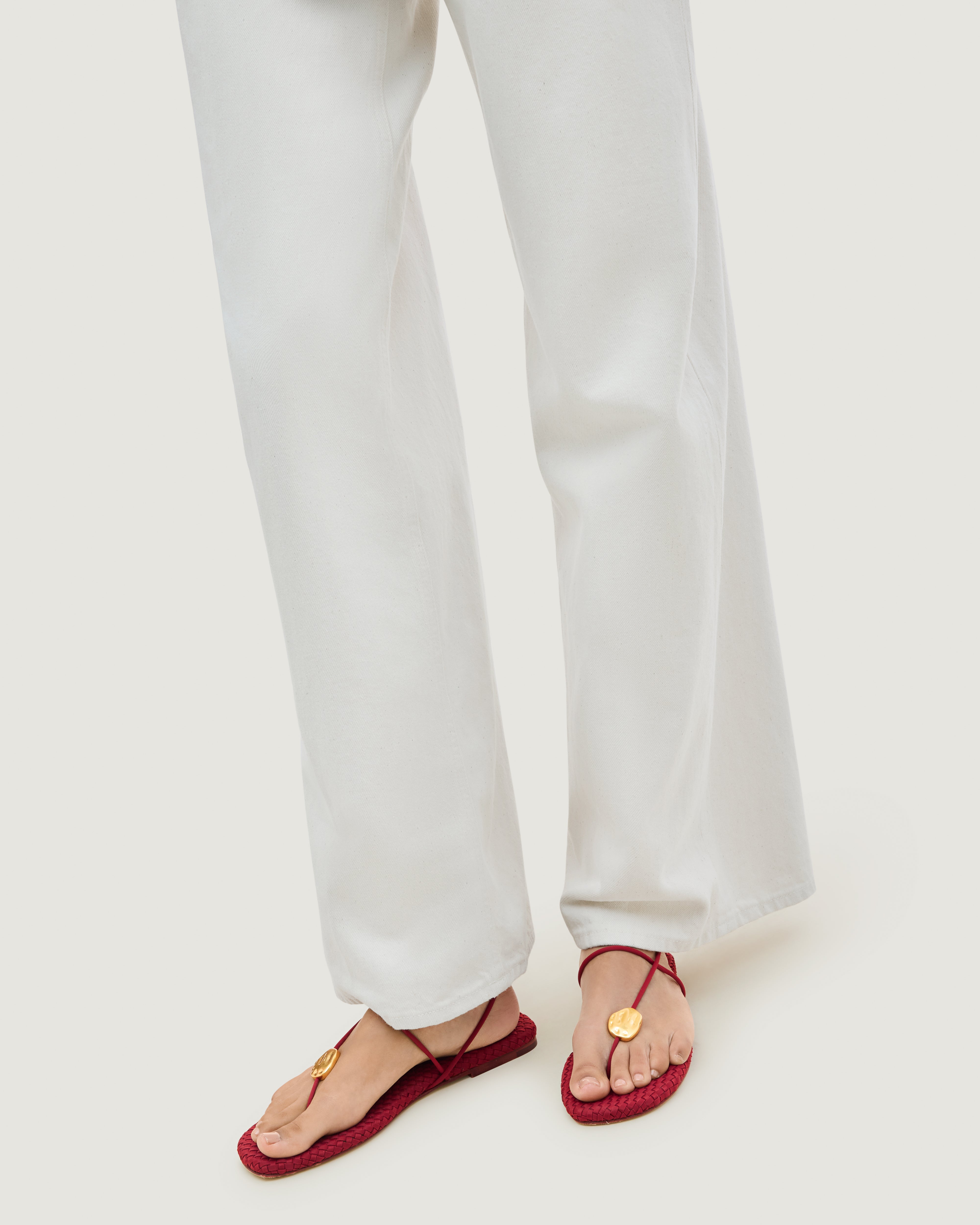 Close up of Gaia Sandal in Rosso on model.