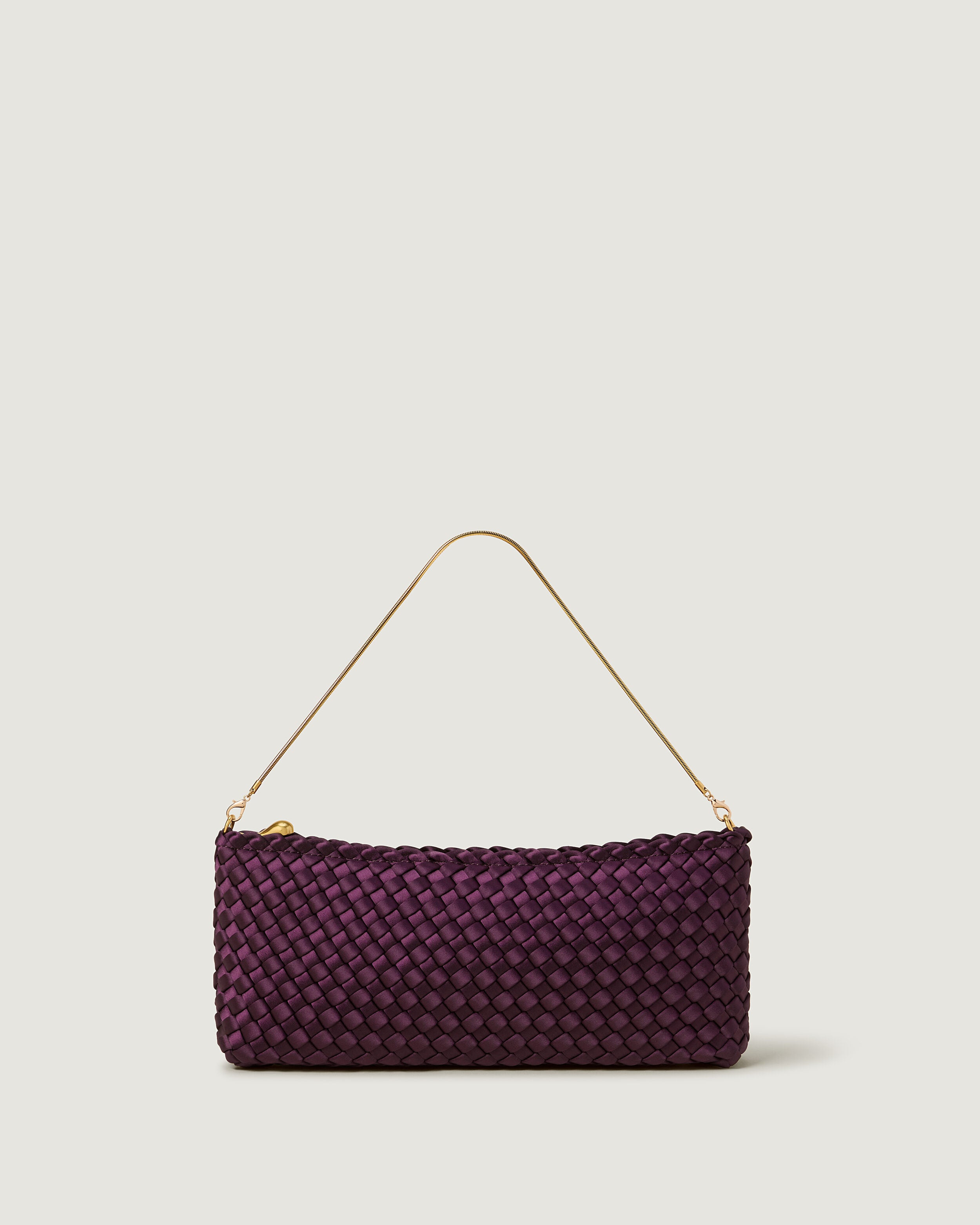 Gala Clutch in Currant, a deep purple tone, in handwoven neoprene, featuring a top zip closure.