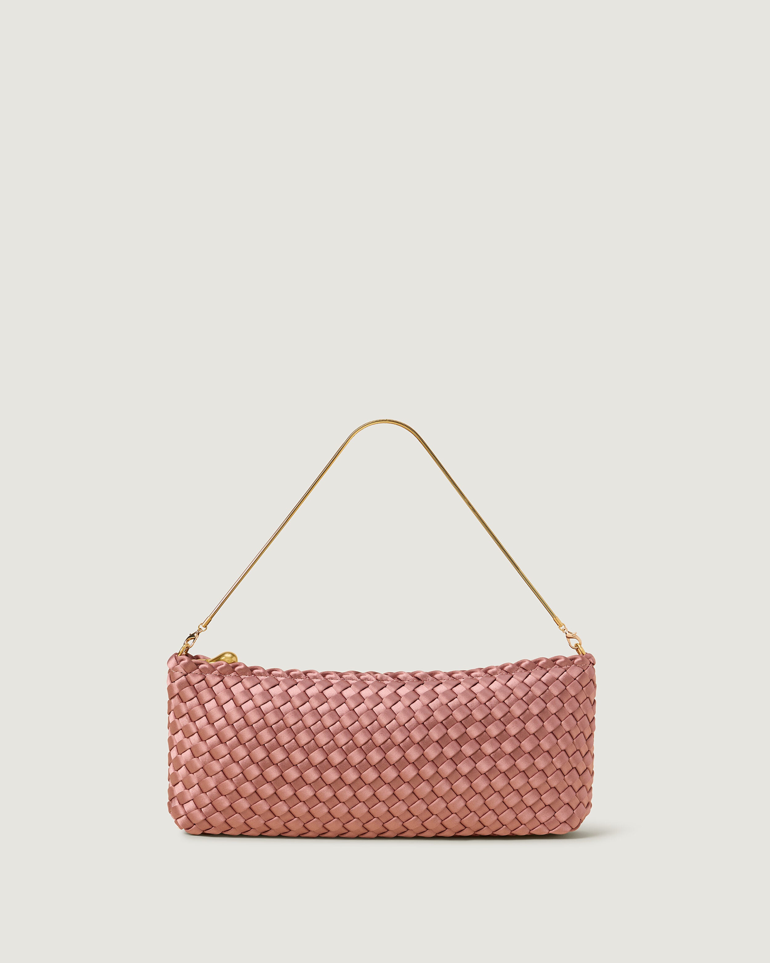 Gala Clutch in Daphne, a coral pink tone, in handwoven neoprene, featuring a top zip closure.