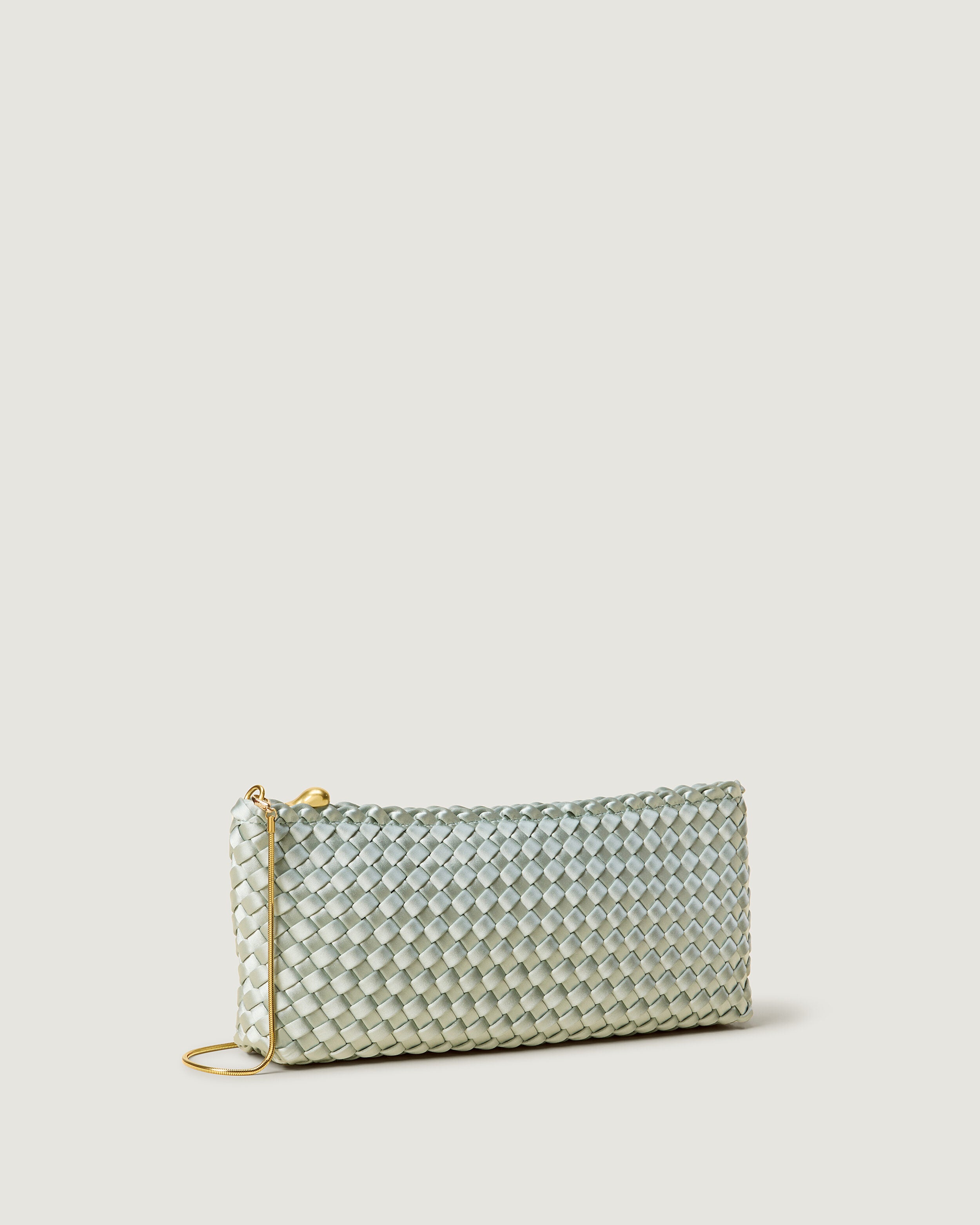 Gala Clutch in Wintergreen shown from a side angle, highlighting its handwoven neoprene construction and top zip closure.