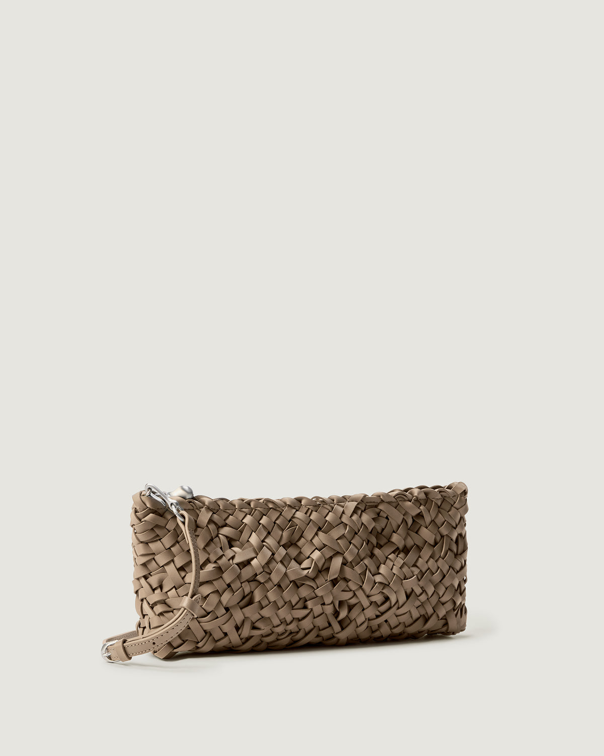 Side view of handwoven neoprene shoulder bag in cool taupe color with a crosshatch nest weave pattern and silver hardware.