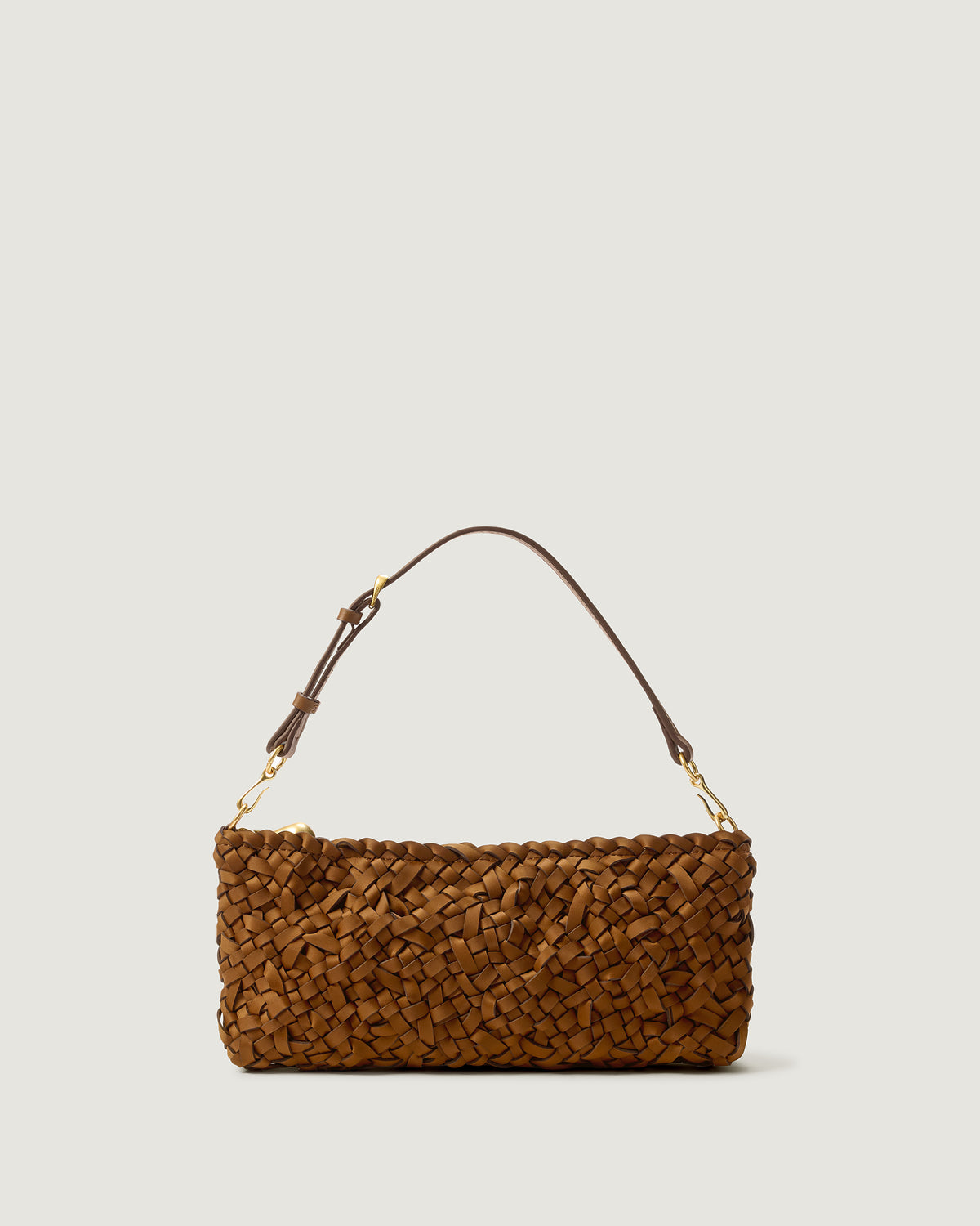 The Gala Clutch in Teak, a handwoven neoprene shoulder bag in saddle brown color with a crosshatch nest weave pattern and gold hardware.