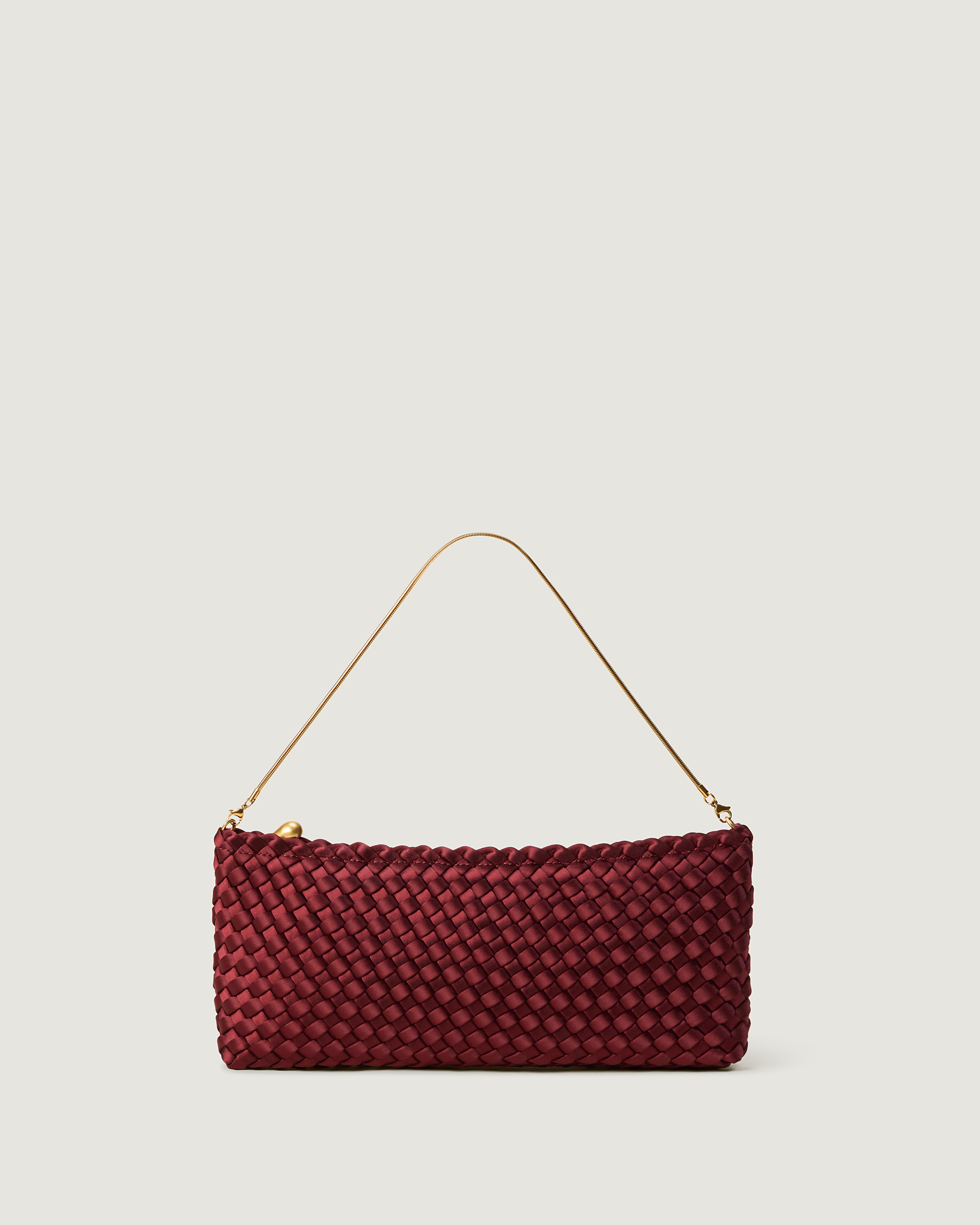 Gala Clutch in Garnet, a crimson tone, in handwoven satin, featuring a top zip closure.