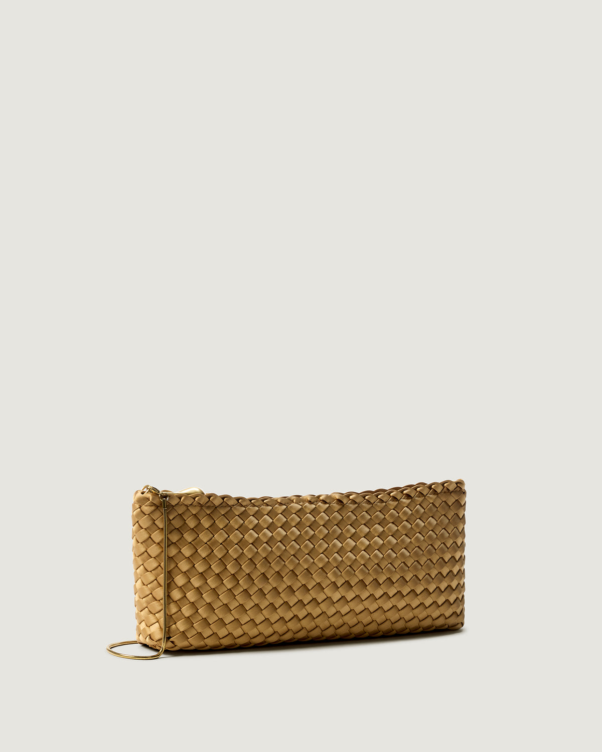 Gala Clutch in Luce shown from a side angle, highlighting its handwoven satin construction and top zip closure.