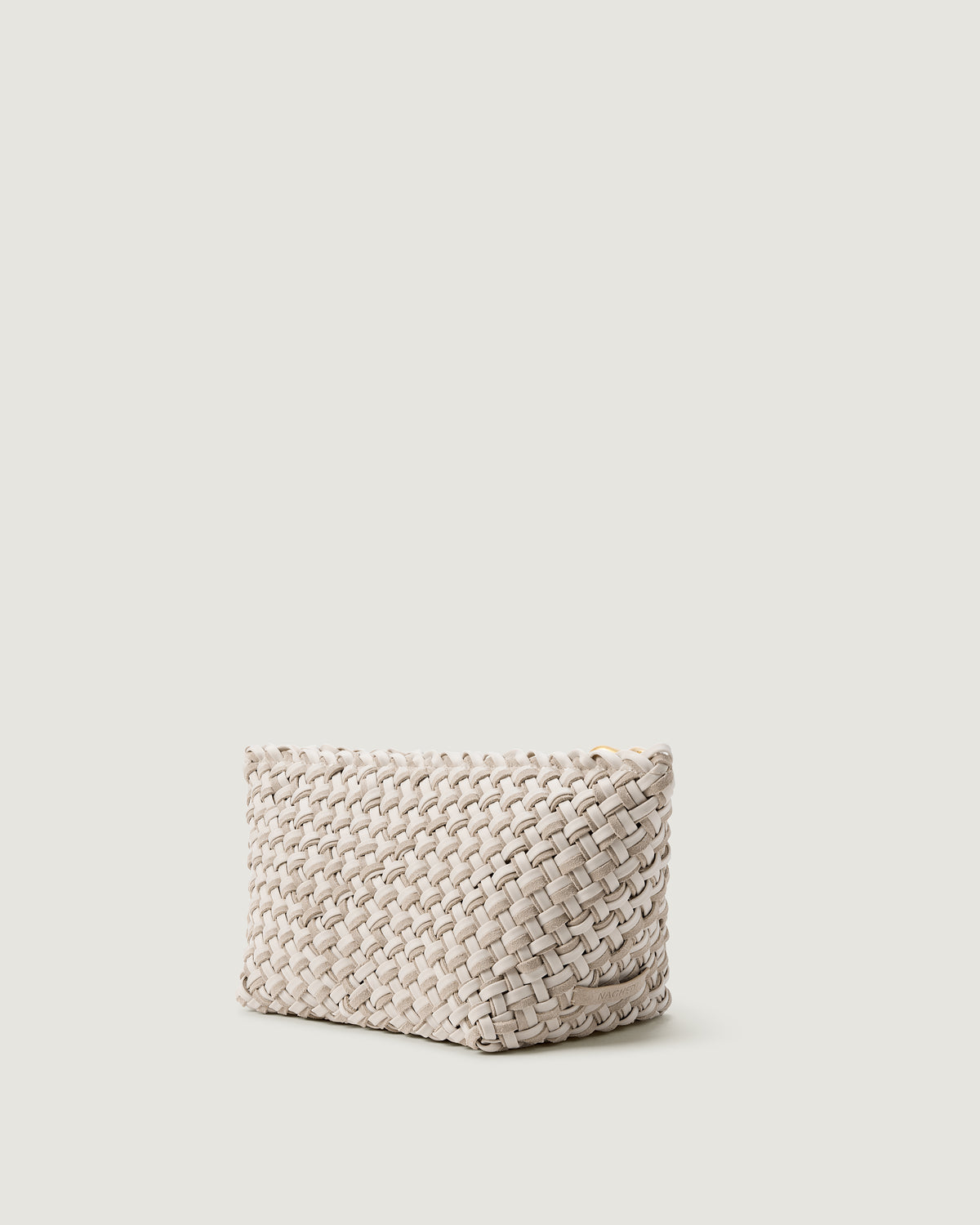 Side view of the Gigi Large Clutch in Linen, a handwoven suede and neoprene clutch with zipper top closure