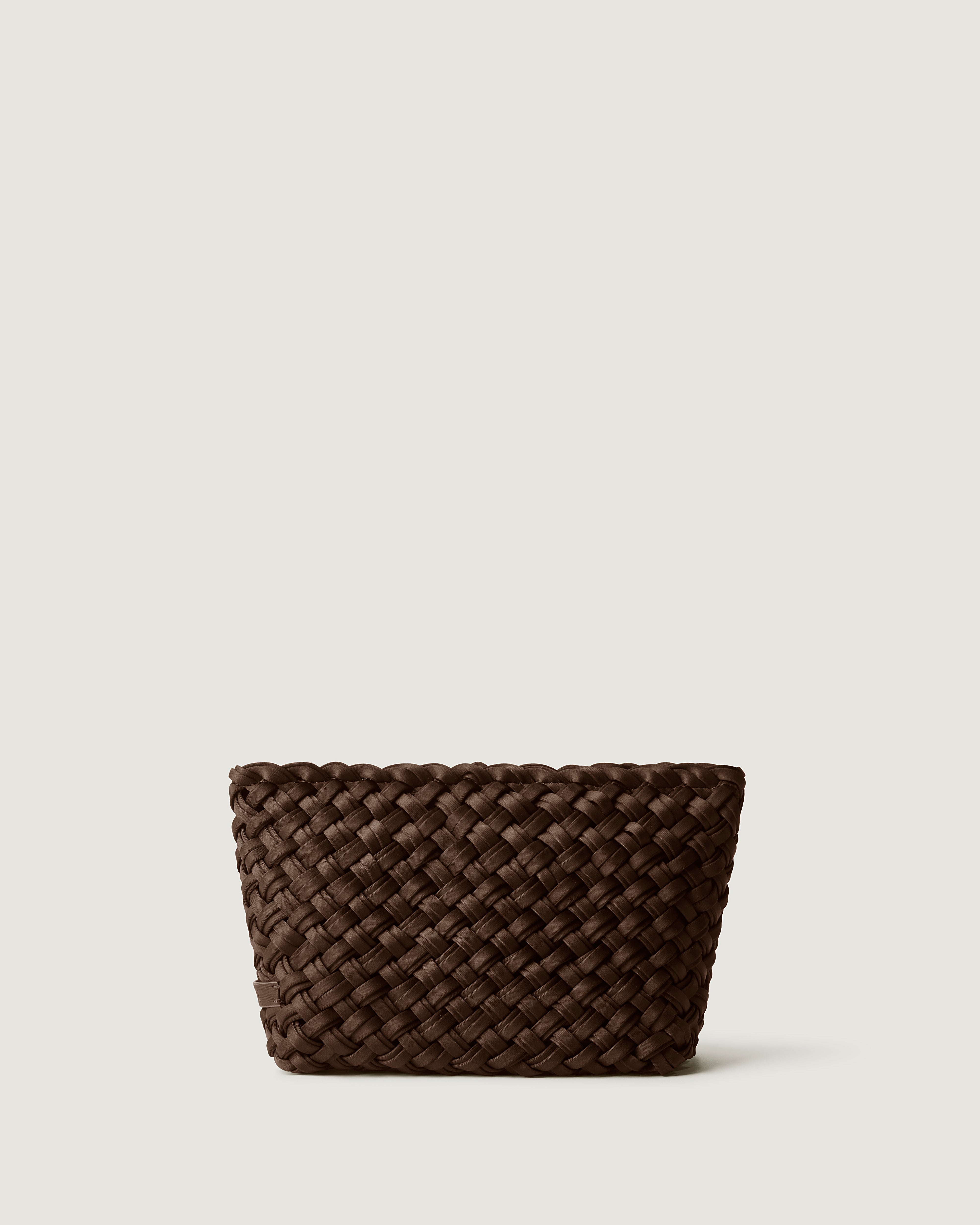 Gigi Clutch in Chocolate, a rich dark brown tone, in handwoven double strands of neoprene, featuring a top zip closure.