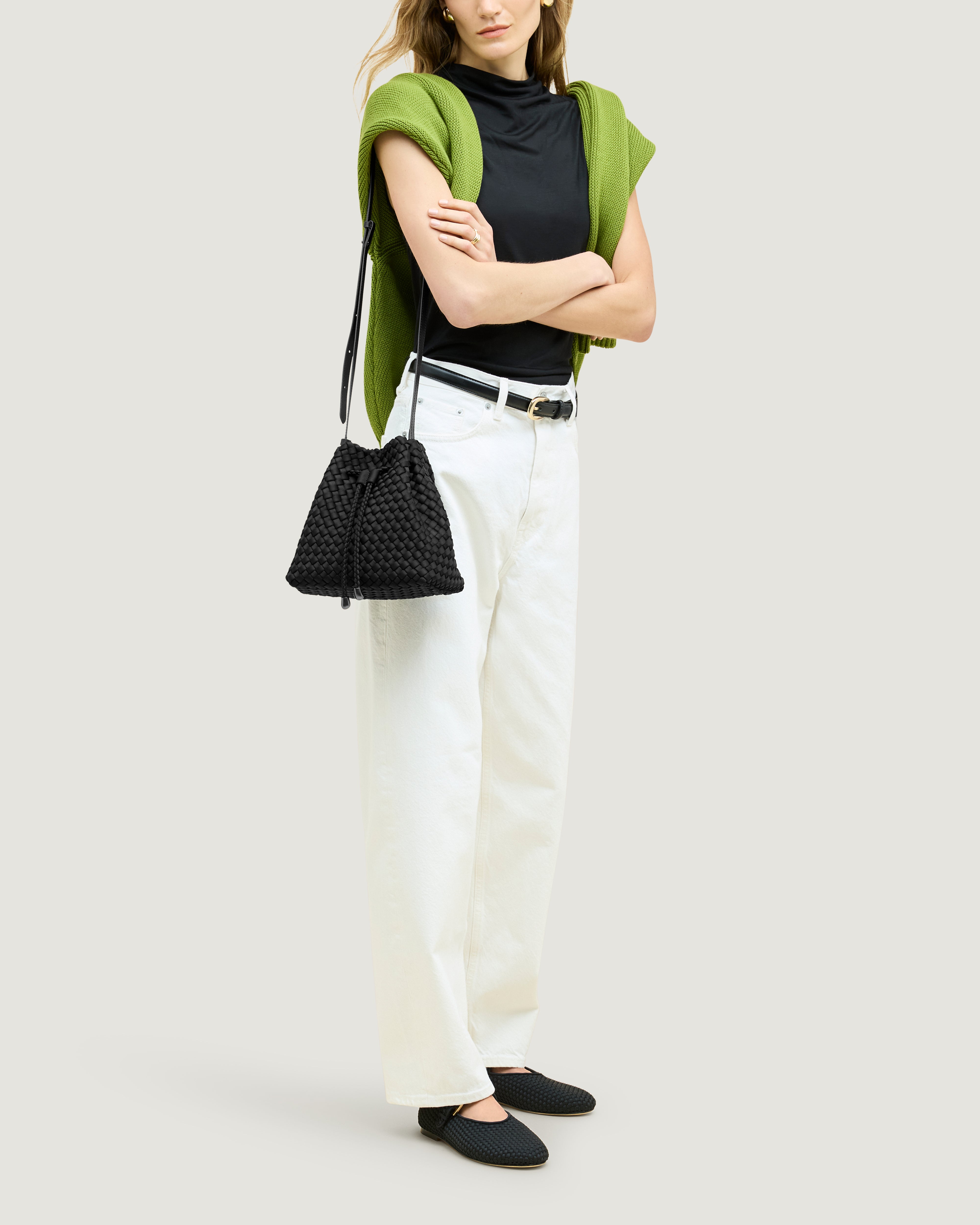 Gramercy Bucket in Onyx shown on model to illustrate scale and soft silhouette.
