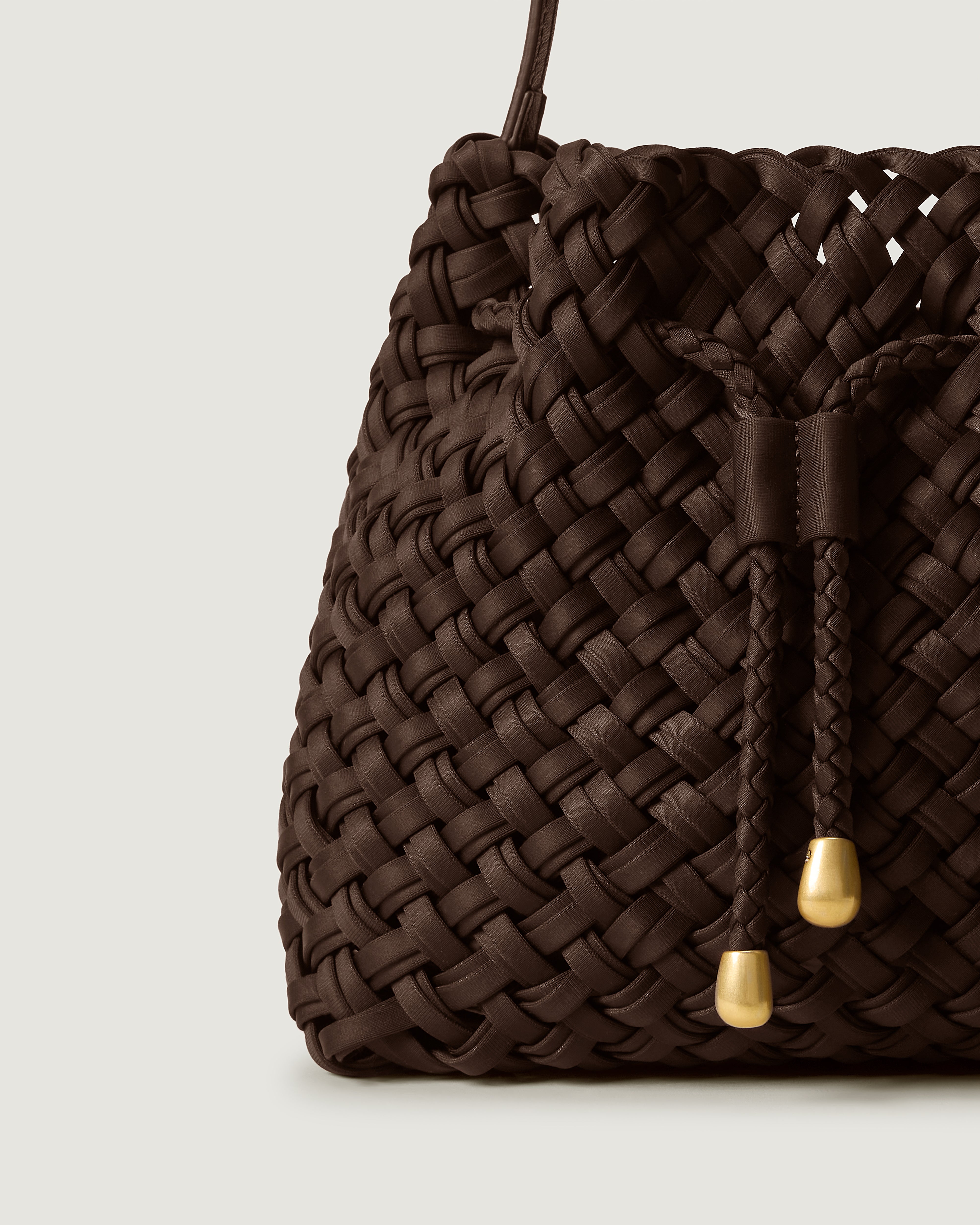 Close-up of handwoven detailing on Gramercy Bucket in Chocolate.