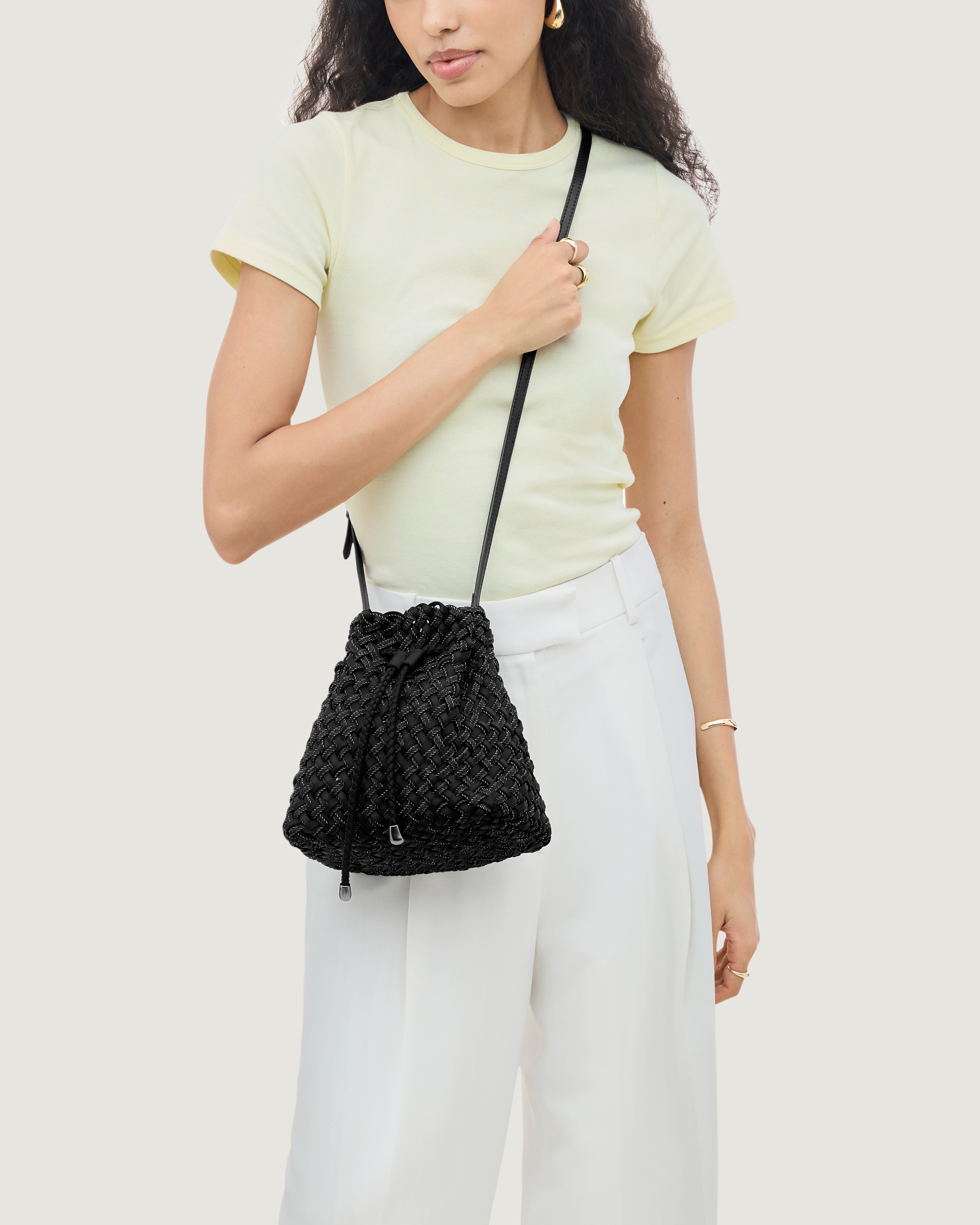 Gramercy Bucket in Jet shown on model to illustrate scale and soft silhouette.