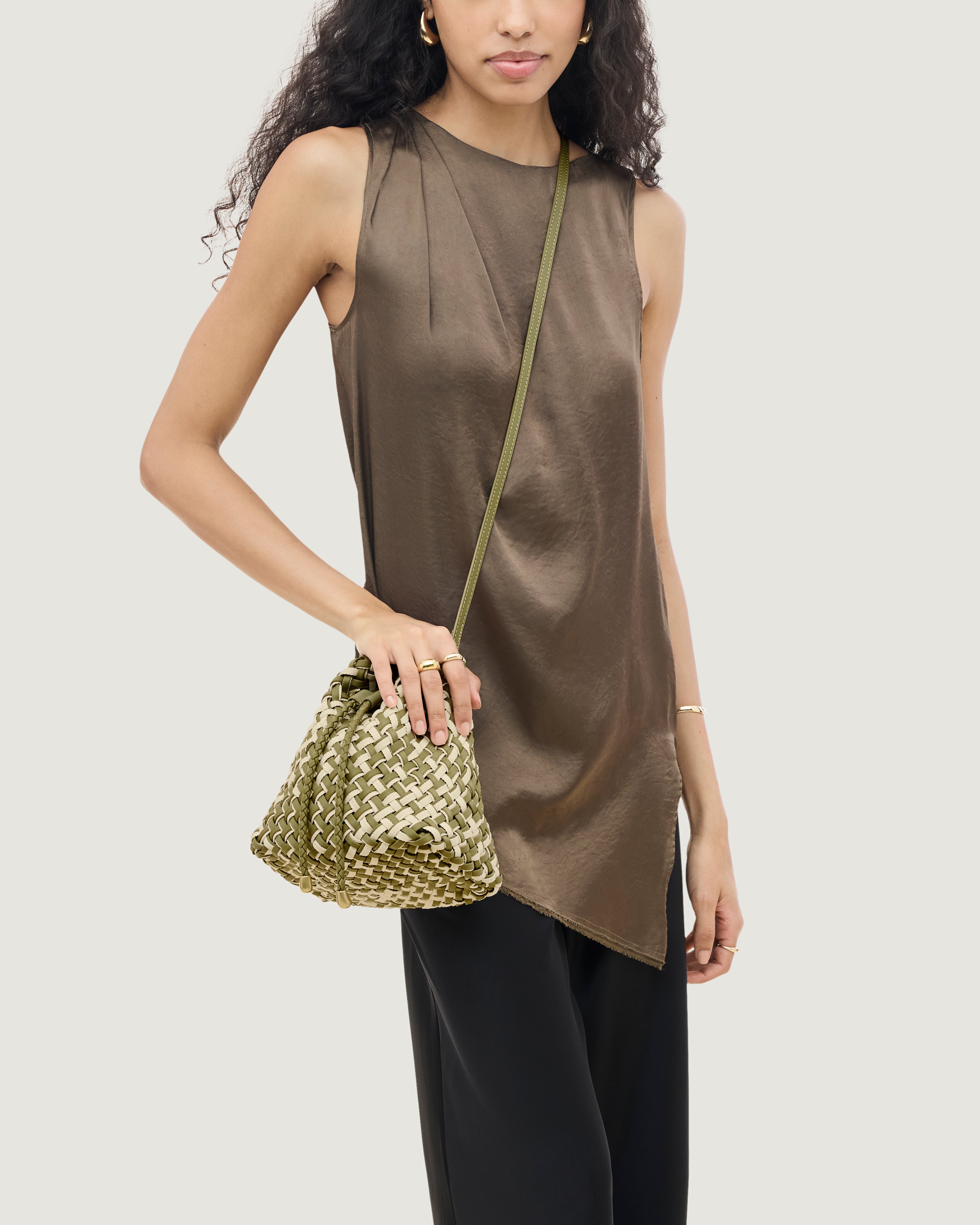 Gramercy Bucket in Oletta shown on model to illustrate scale and soft silhouette.