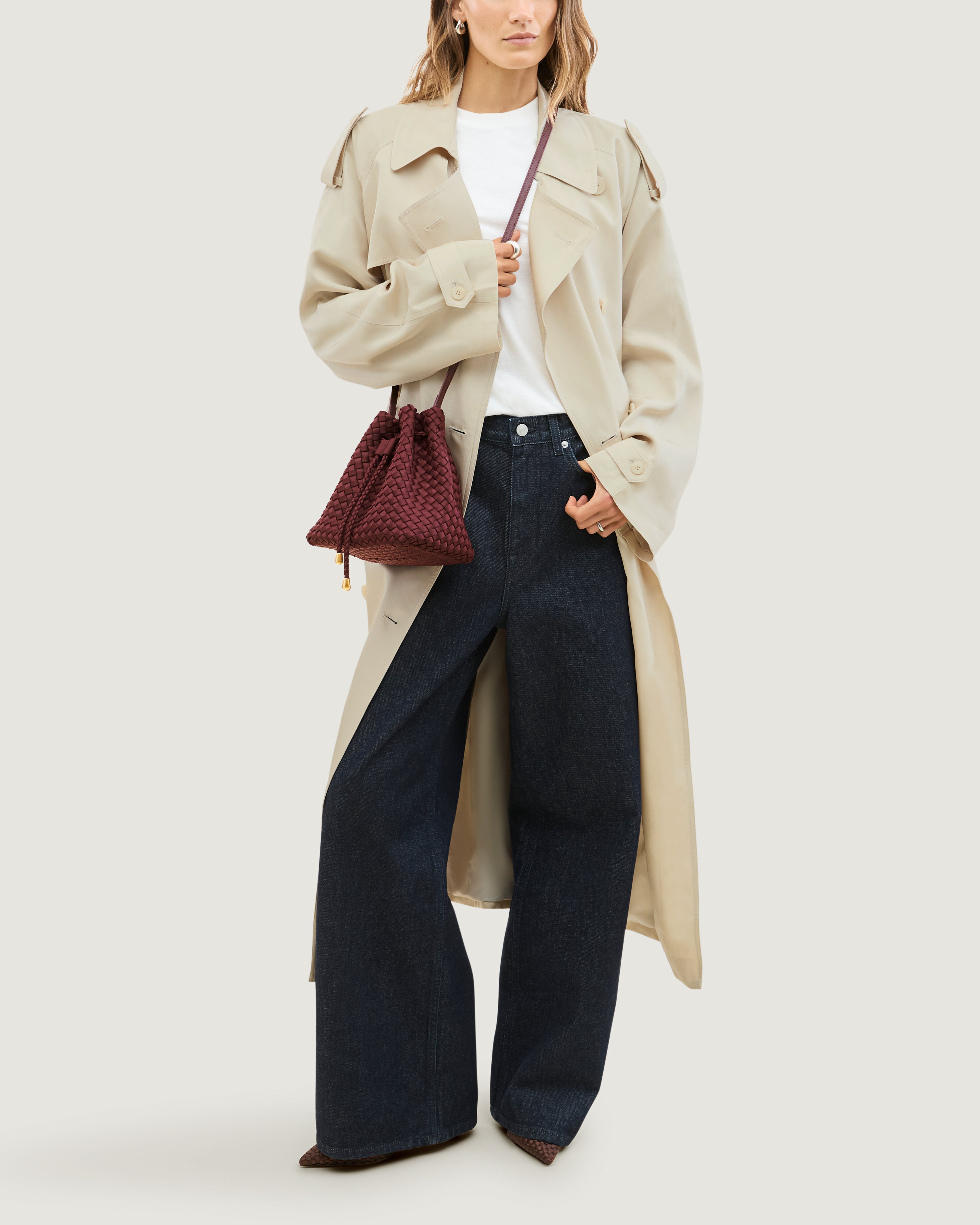 Gramercy Bucket in Bordeaux shown on model to illustrate scale and soft silhouette.
