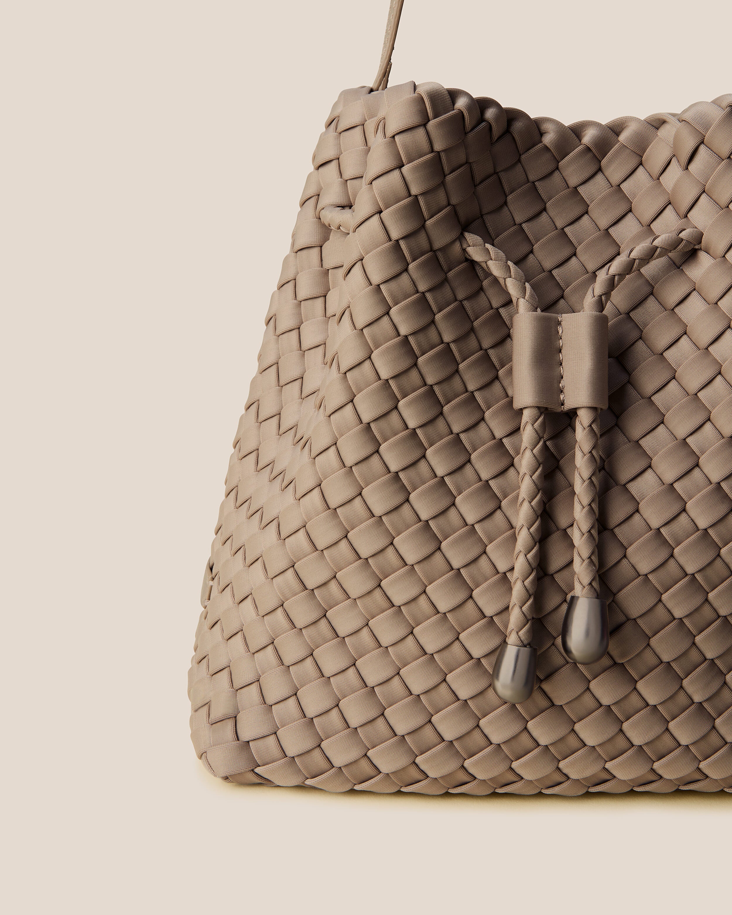 Close-up of handwoven detailing on Gramercy Bucket in Cashmere.