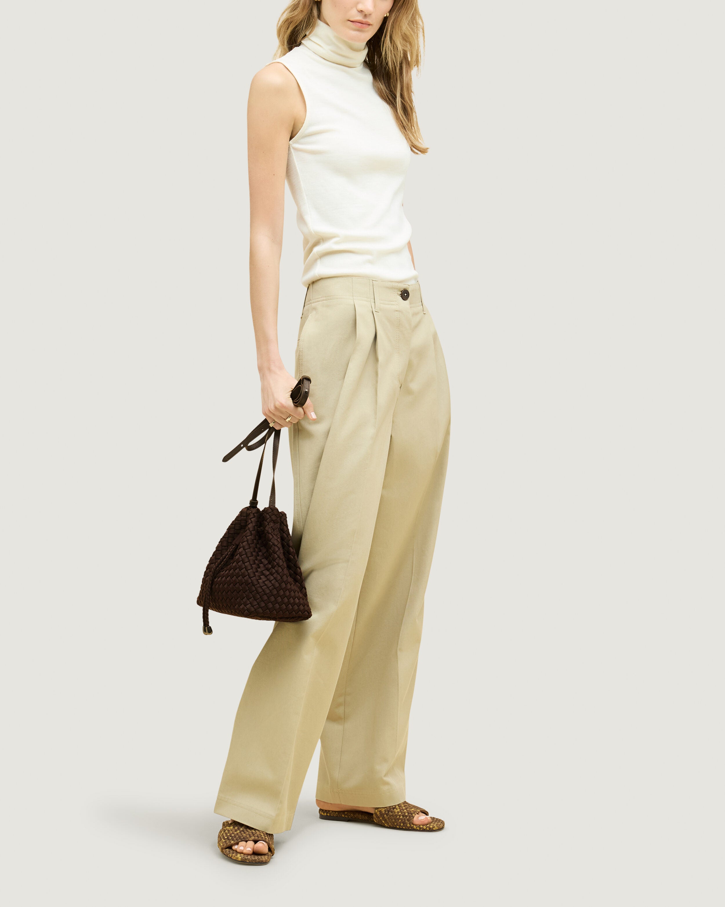 Gramercy Bucket in Chocolate shown on model to illustrate scale and soft silhouette.