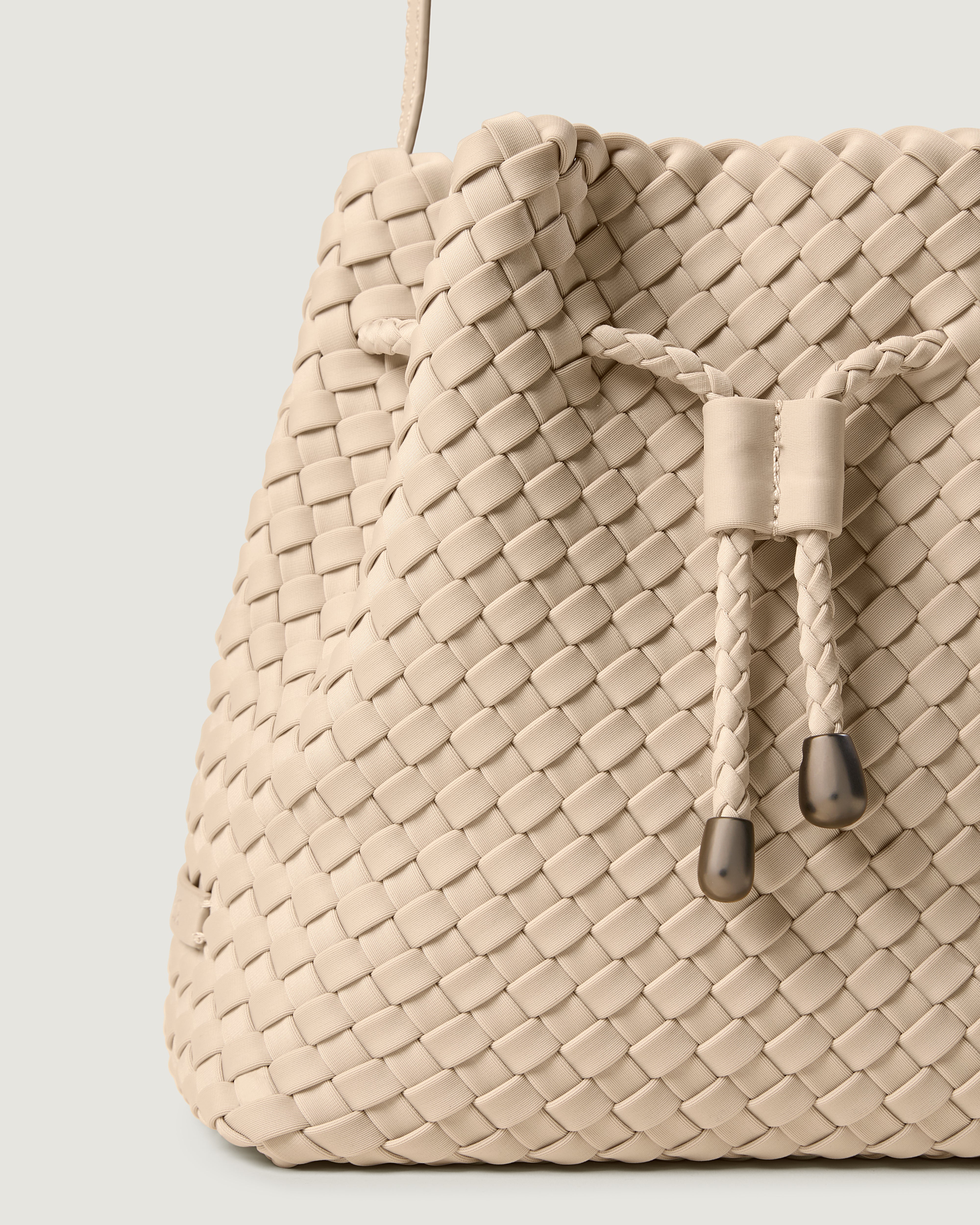 Close-up of handwoven detailing on Gramercy Bucket in Ecru.