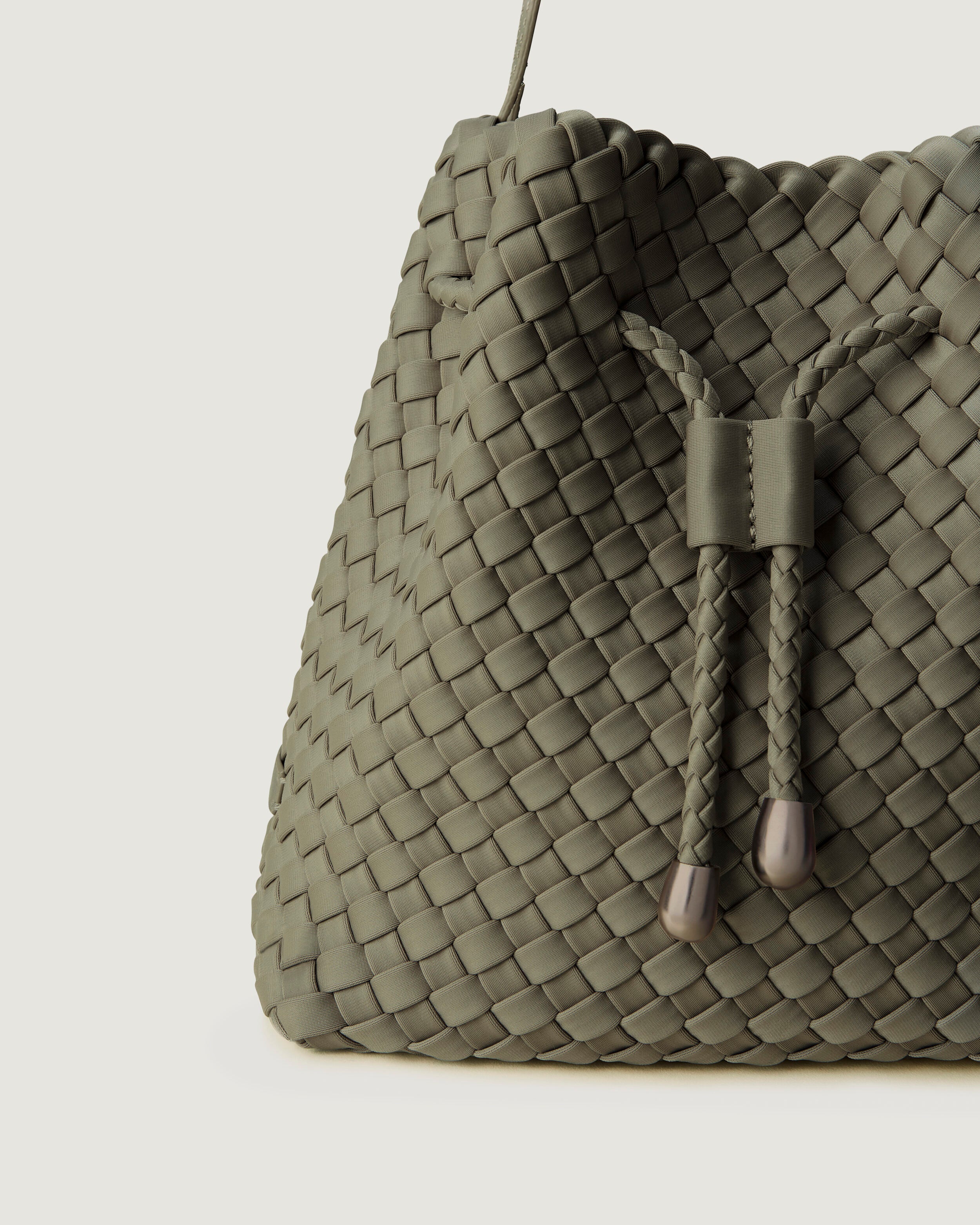 Close-up of handwoven detailing on Gramercy Bucket in Olea.