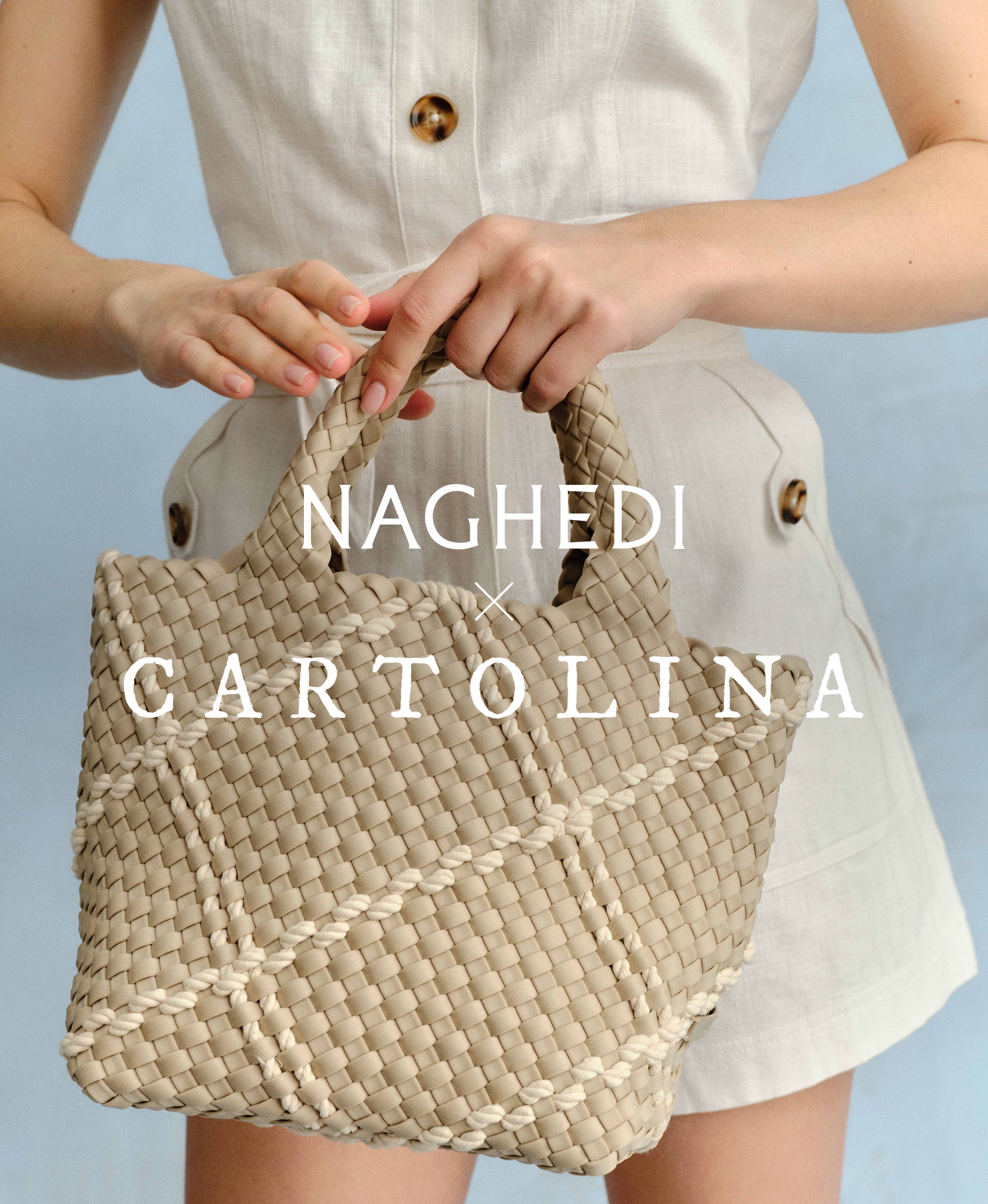 Person holding a woven neoprene handbag with 'Naghedi x Cartolina' branding against a light blue background.