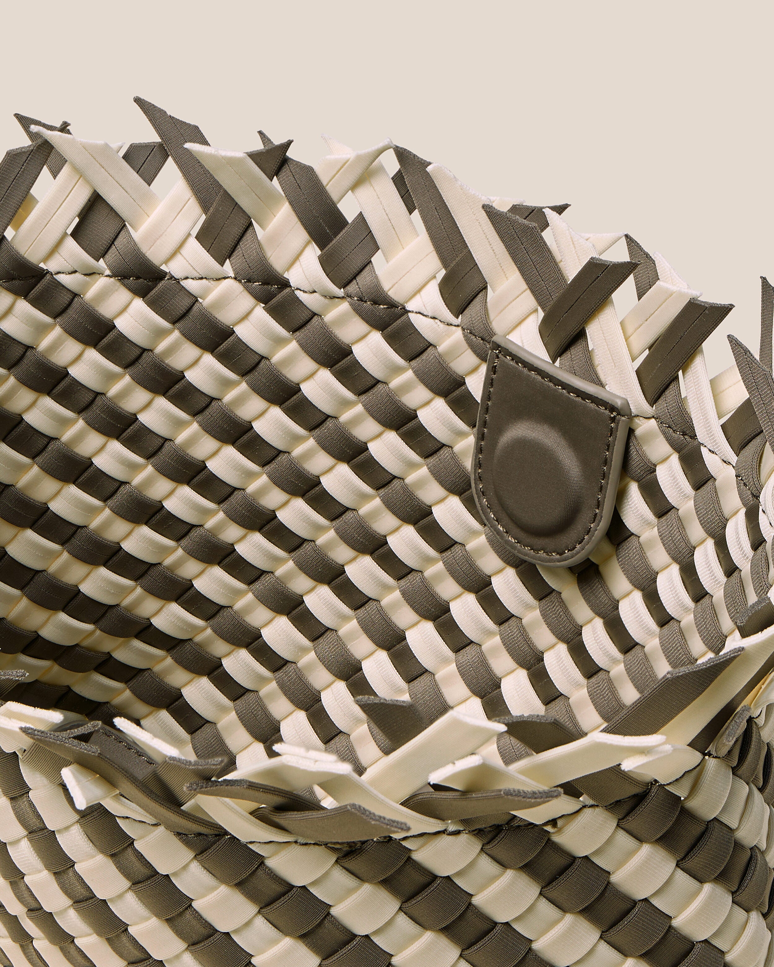 Interior close-up of Havana  in Carrara showing its magnetic snap closure, and unlined interior.