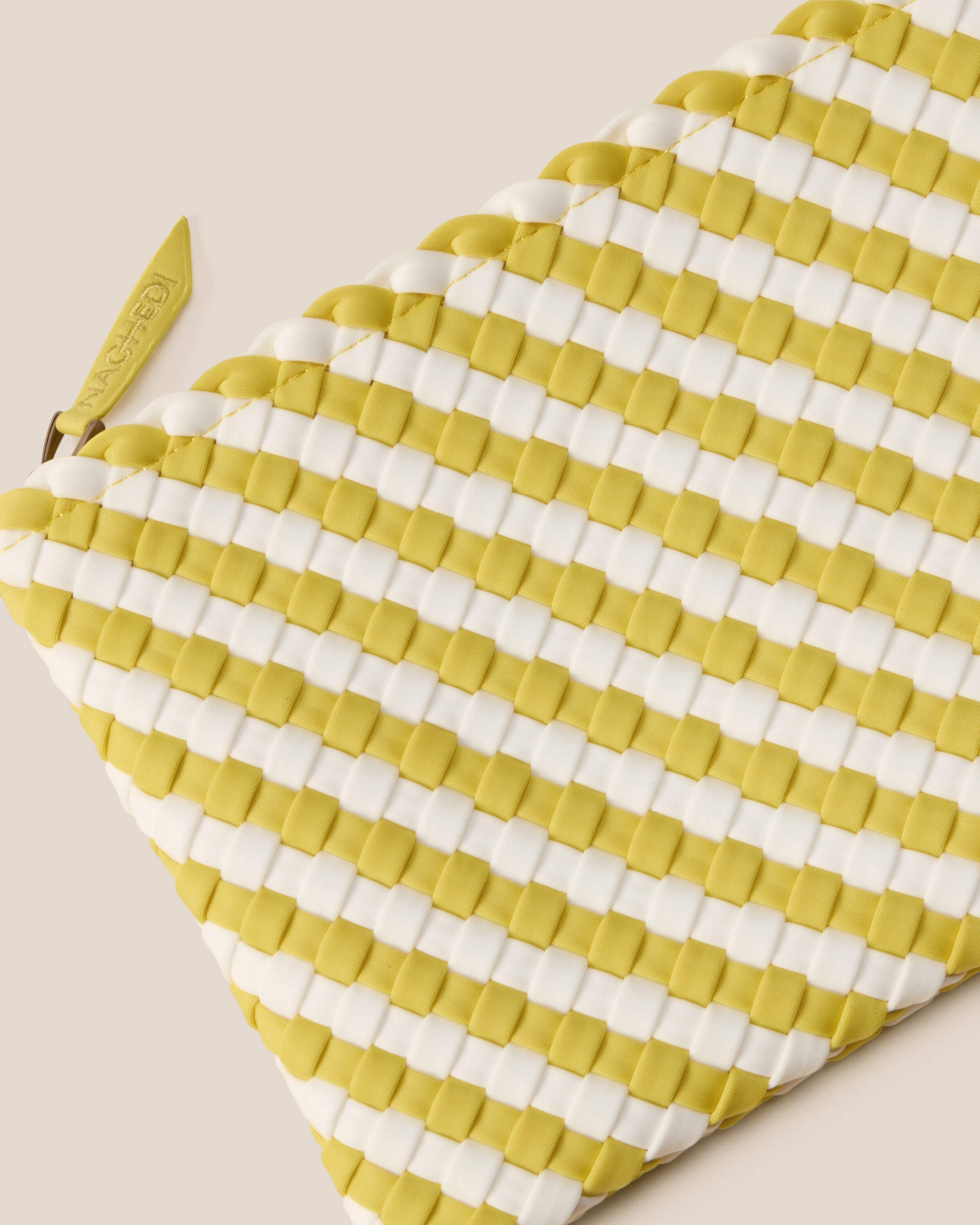 Close-up of included matching woven zippered pouch.