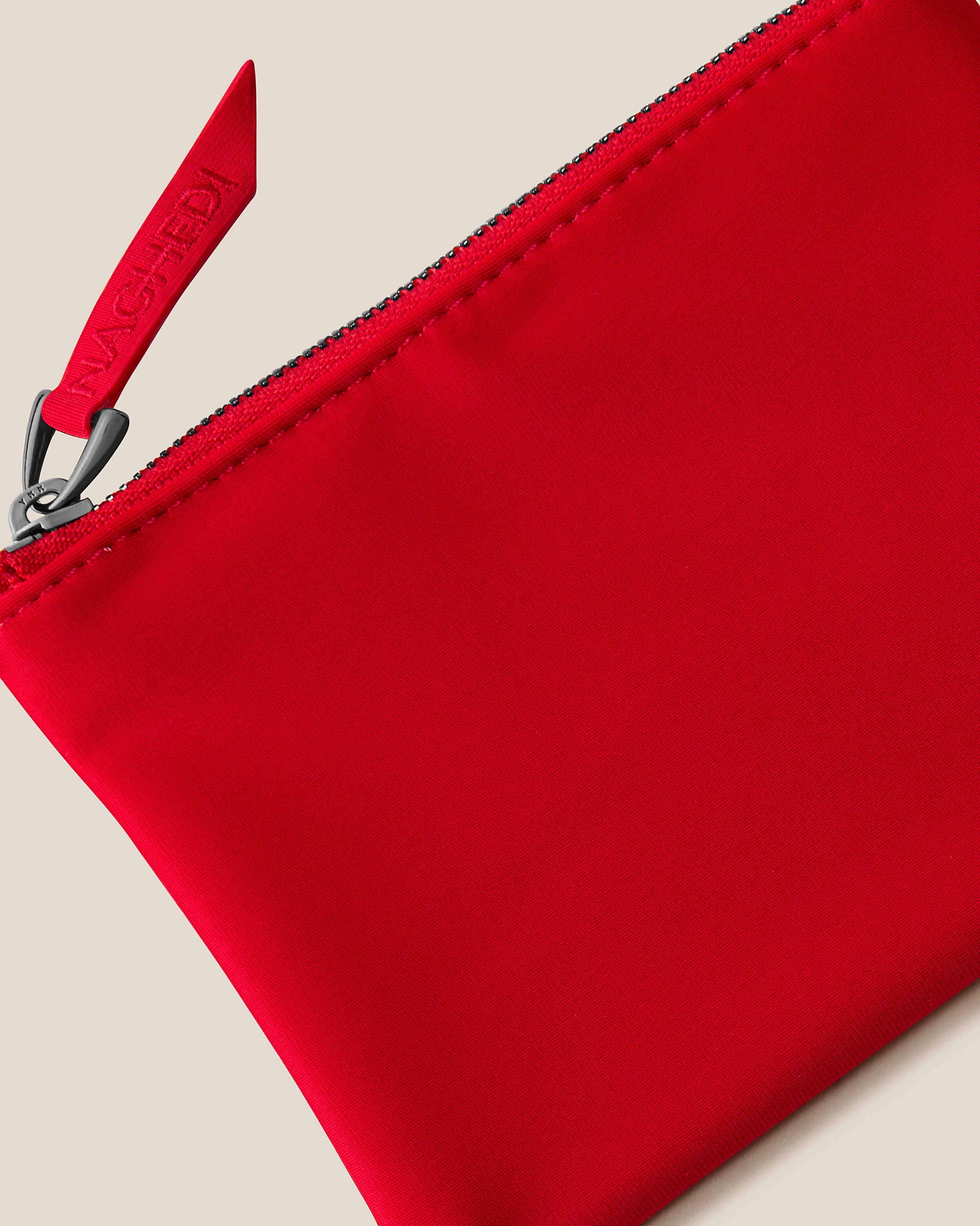 Close-up of included coordinating neoprene zippered pouch.