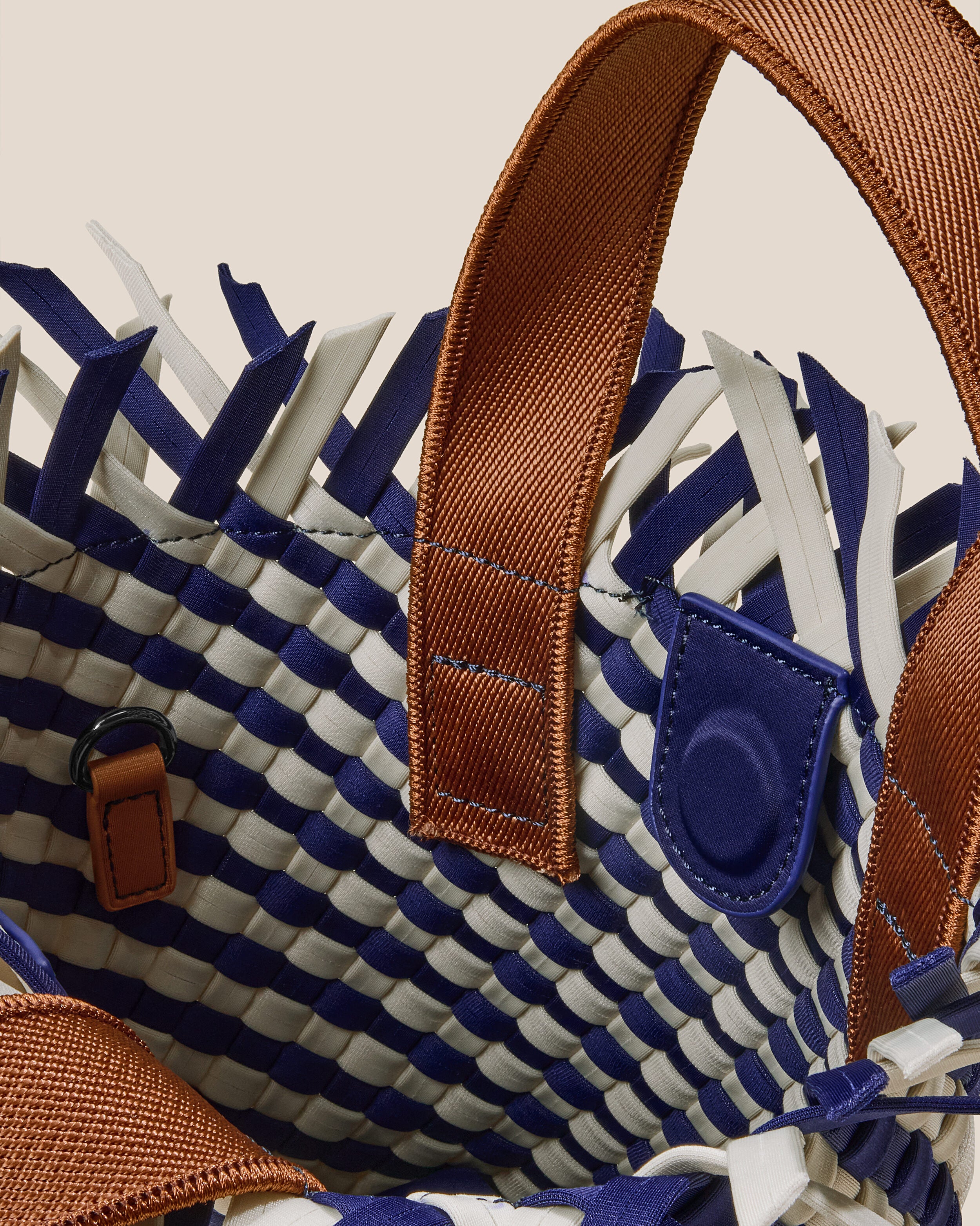 Interior close-up of Havana  in Venice showing its open top with magnetic snap closure, and unlined interior.