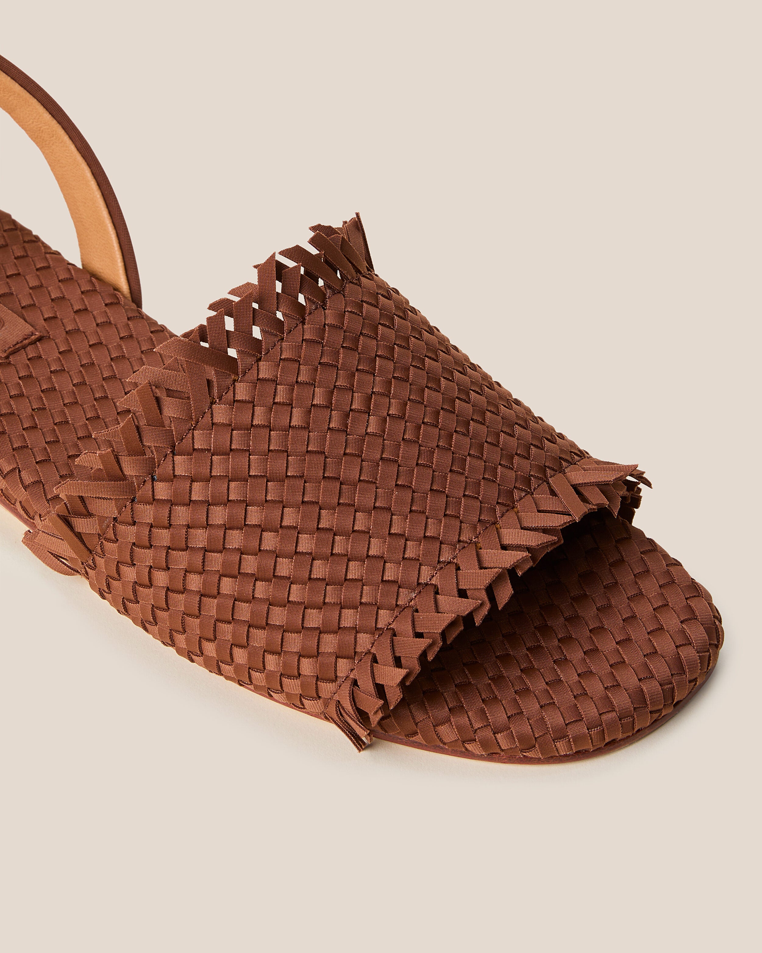 Close-up of The Havana Sandal in Adobe showing its open toe and square silhouette.
