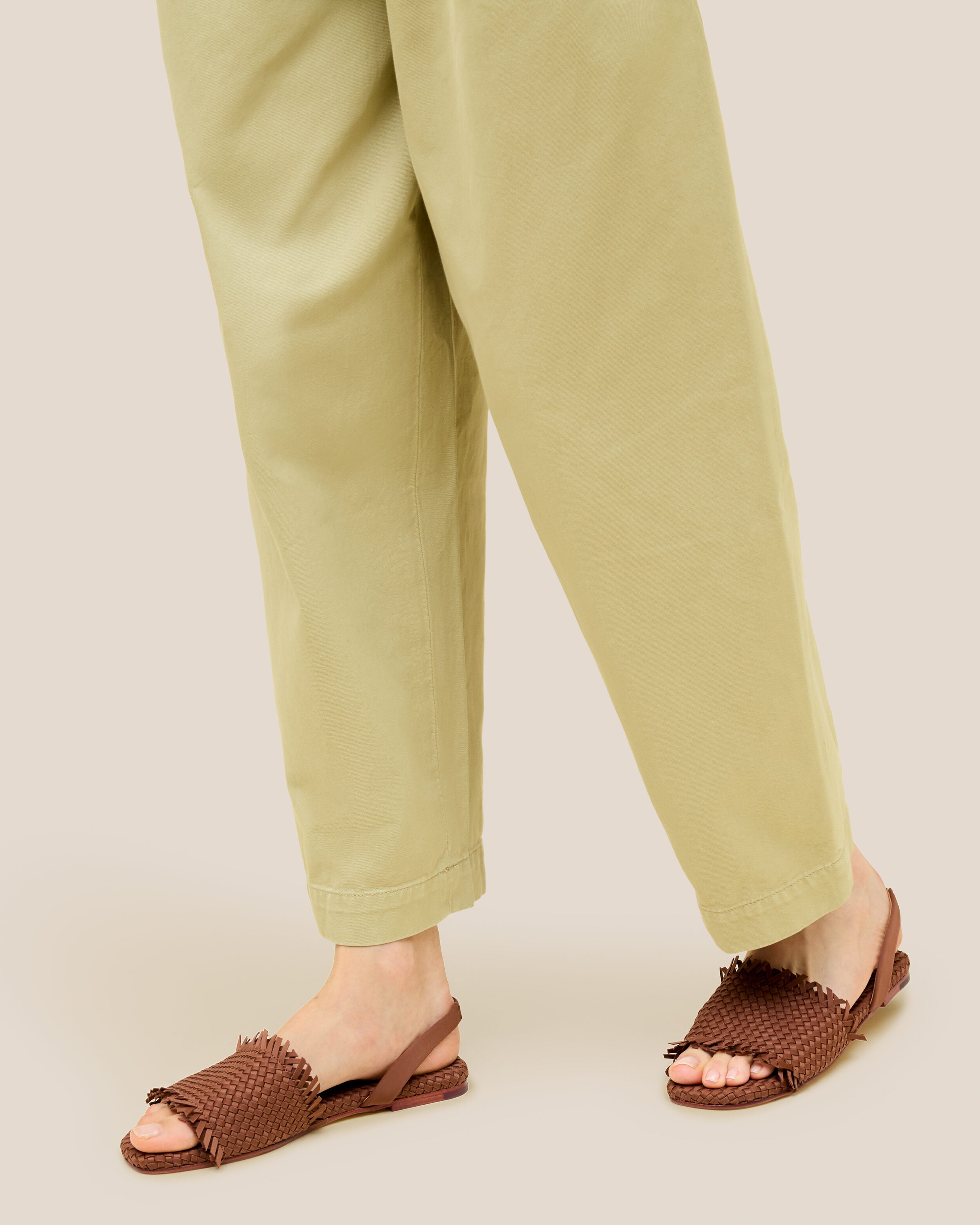 The Havana Sandal in Adobe shown on model.