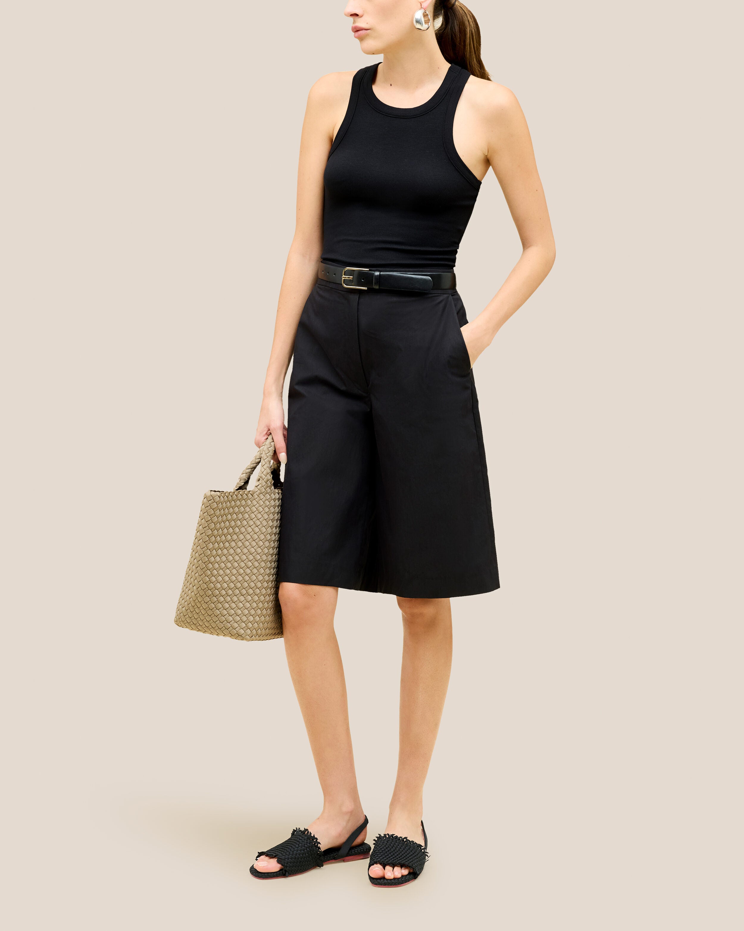 The Havana Sandal in Onyx shown on model.