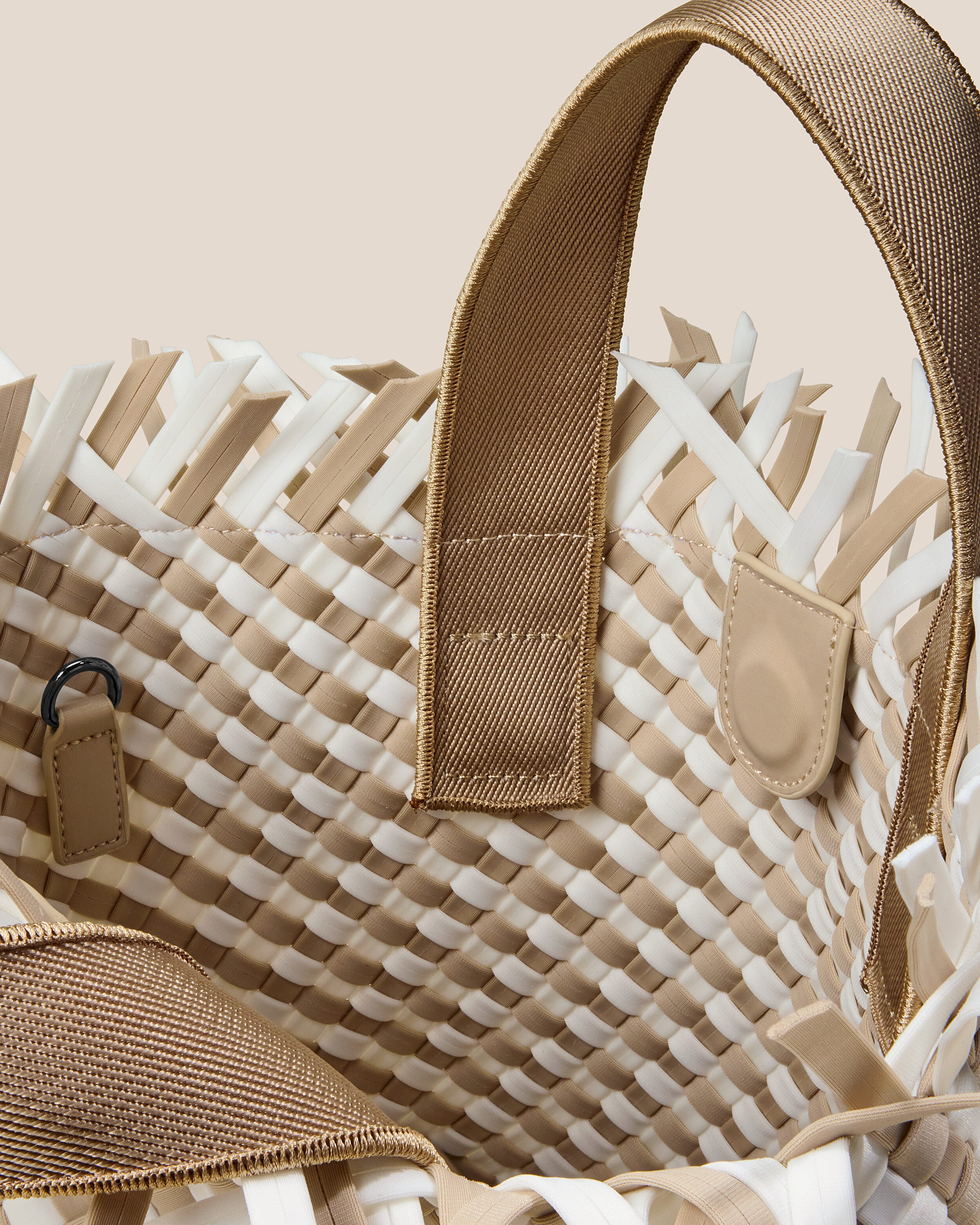 Interior close-up of Havana  in Almaza showing its open top with magnetic snap closure, and unlined interior.