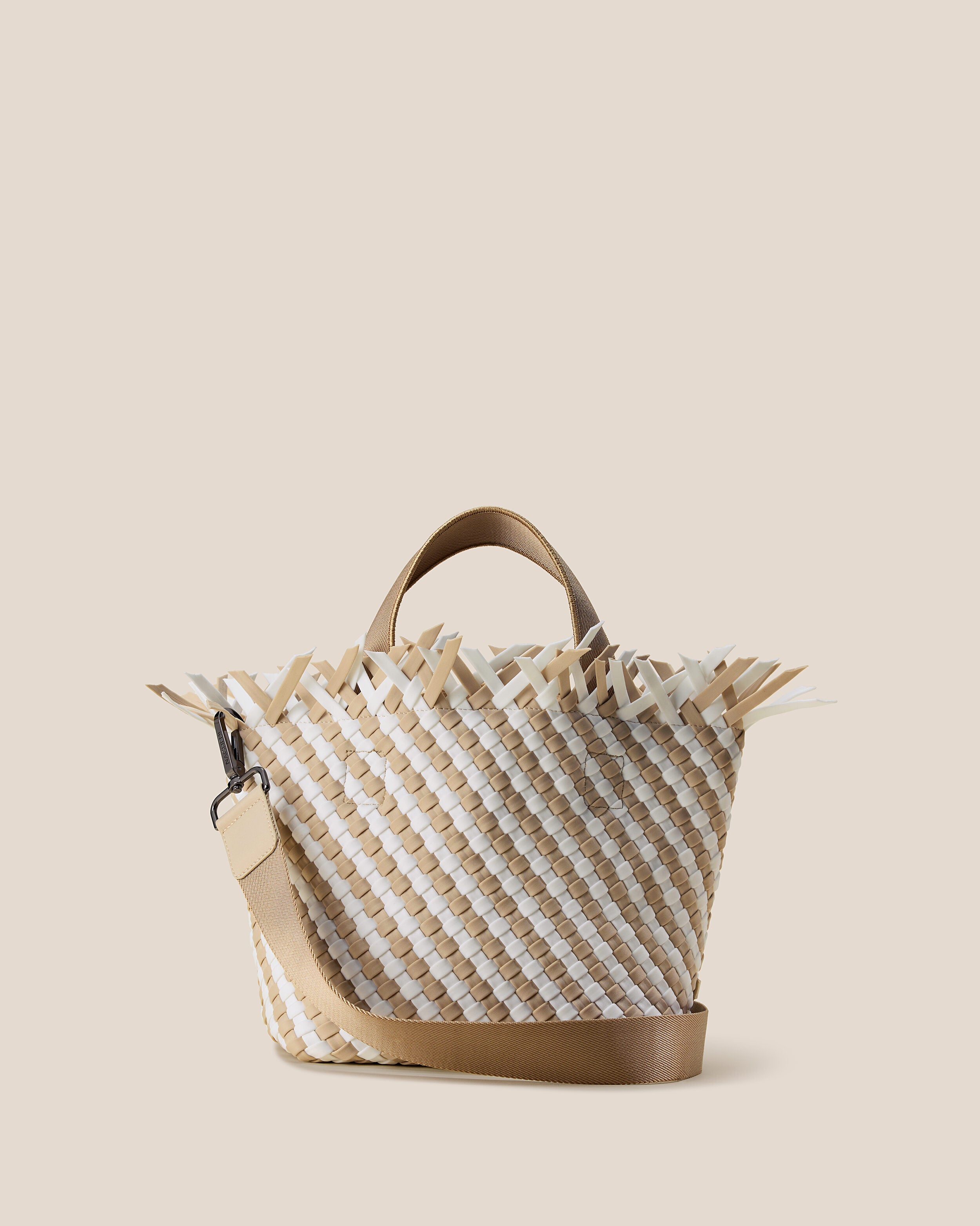 Havana  in Almaza, a white and cream tone, in handwoven neoprene, featuring an open top with magnetic snap closure, sleek nylon webbing handles, and detachable, adjustable nylon crossbody strap.