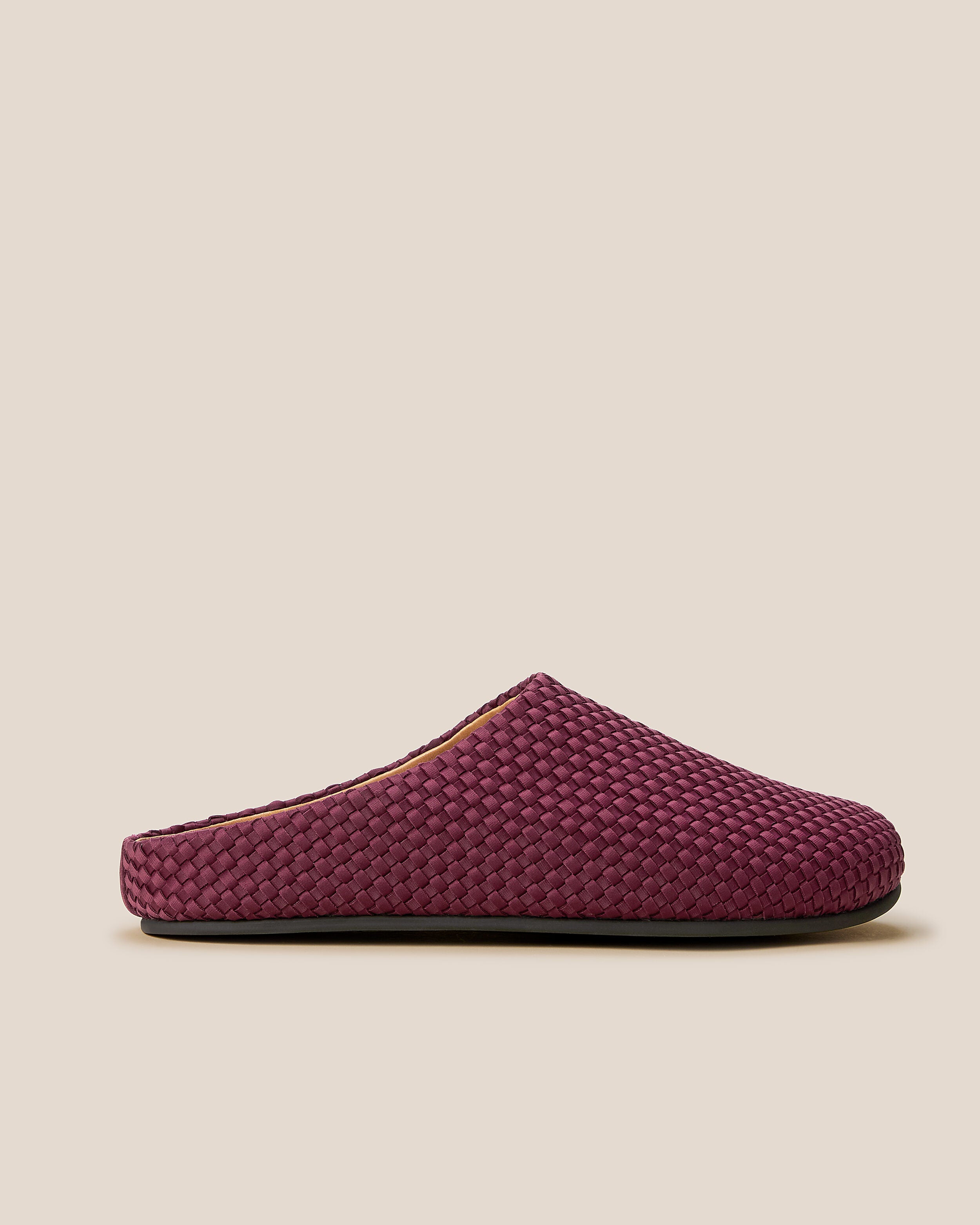 Side view of The Hudson Clog in Bordeaux, a rich burgundy tone, featuring a closed toe and round silhouette.