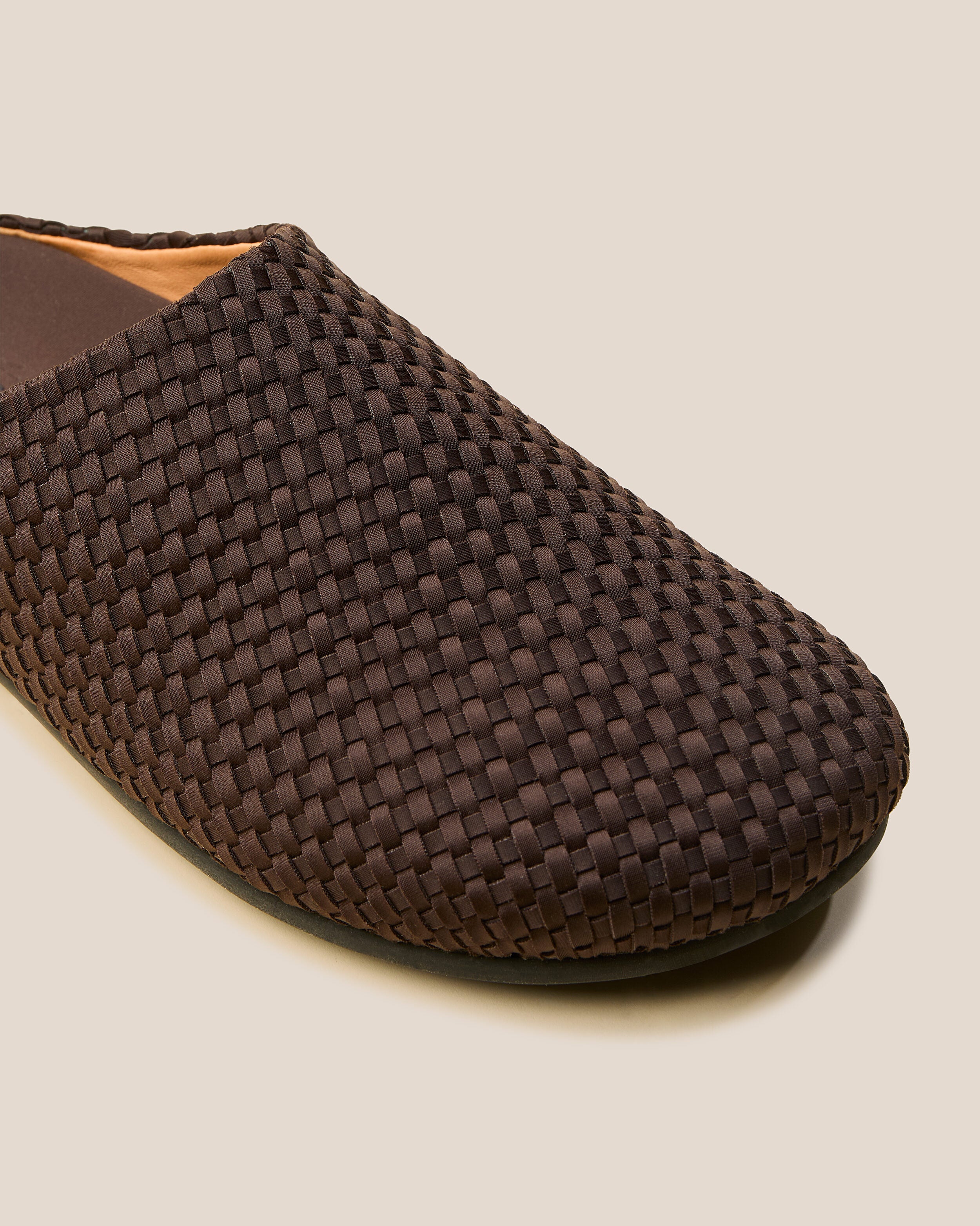 Close-up of The Hudson Clog in Chocolate showing its closed toe and round silhouette.