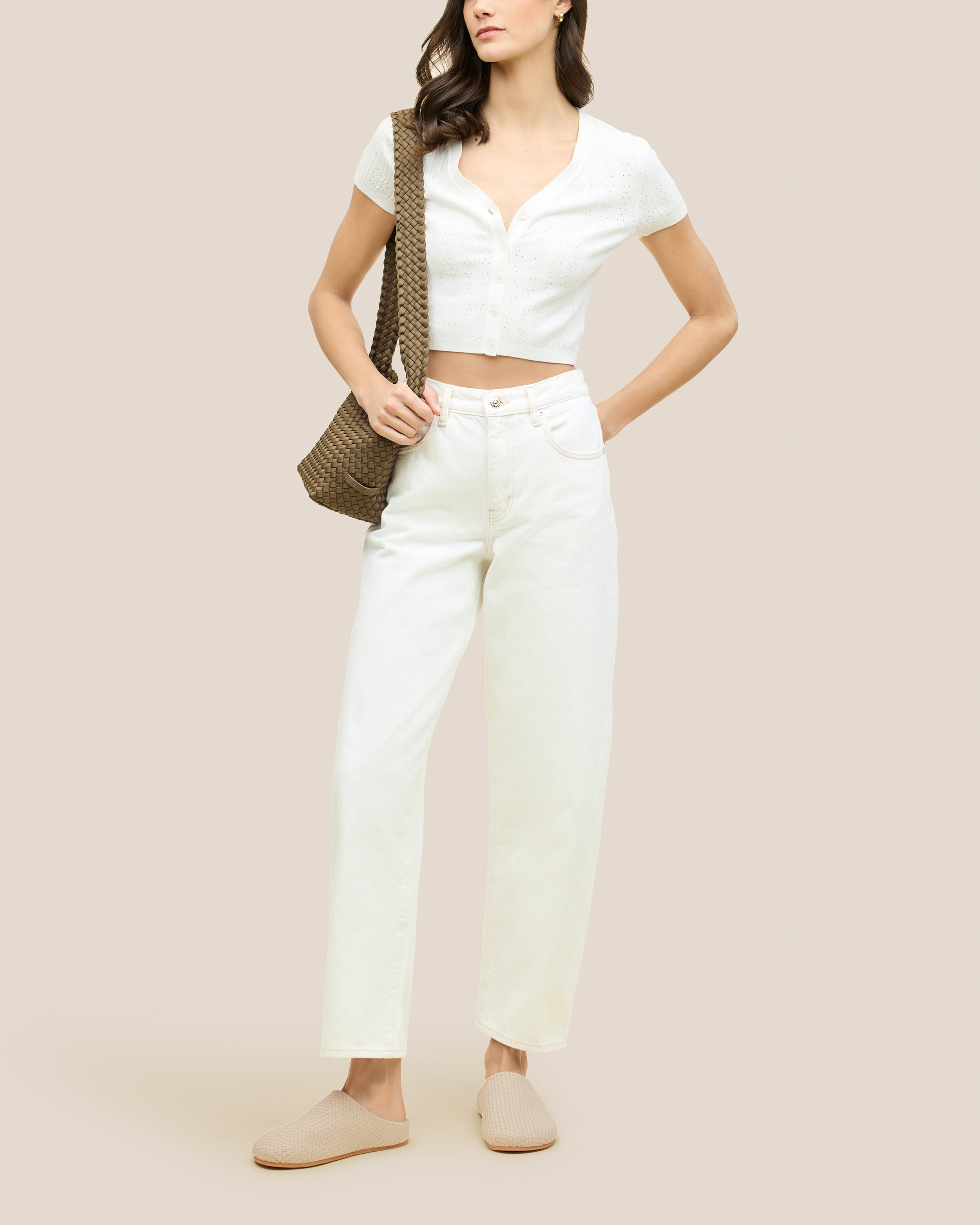 The Hudson Clog in Ecru shown on model.