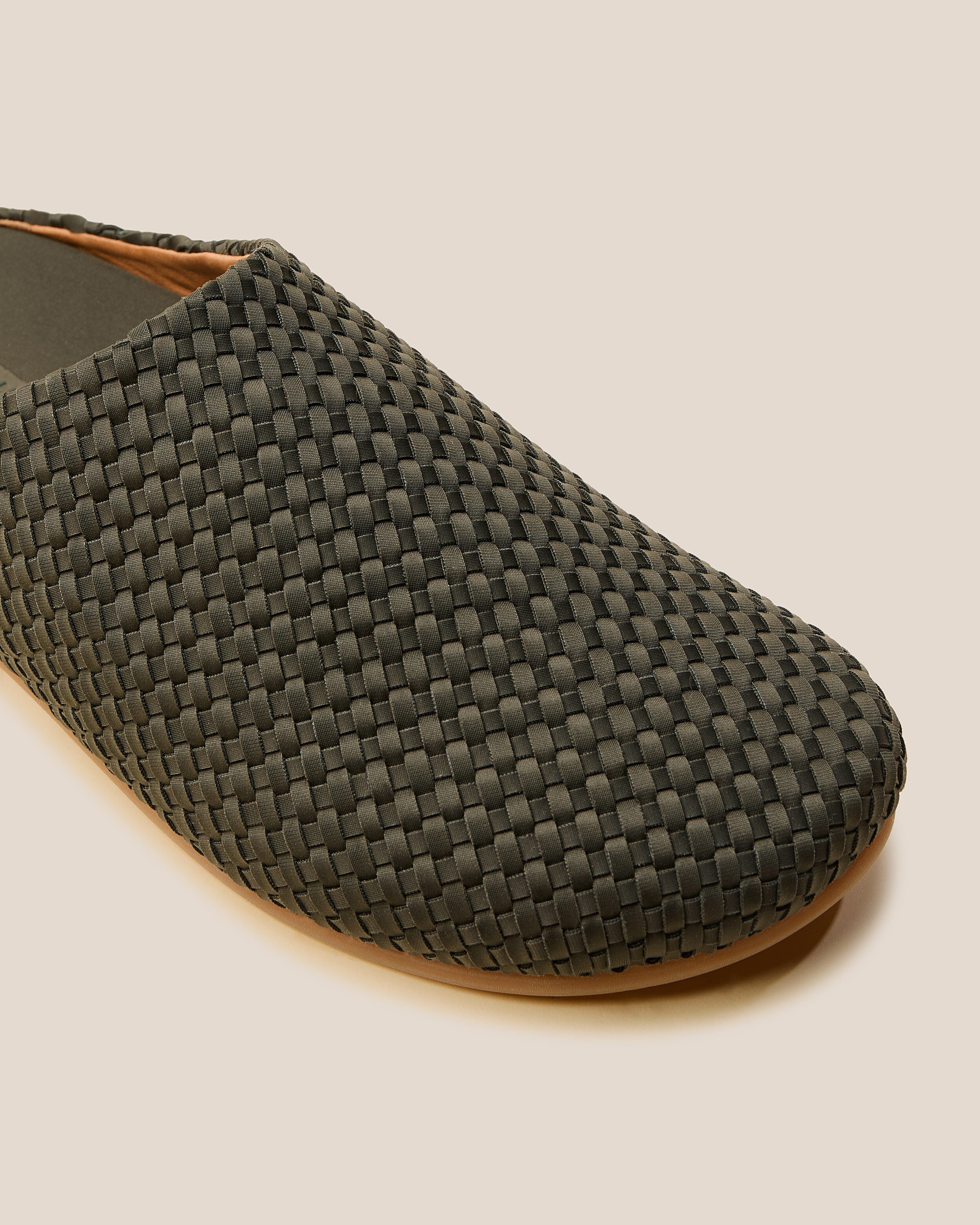 Close-up of The Hudson Clog in Olive showing its closed toe and round silhouette.
