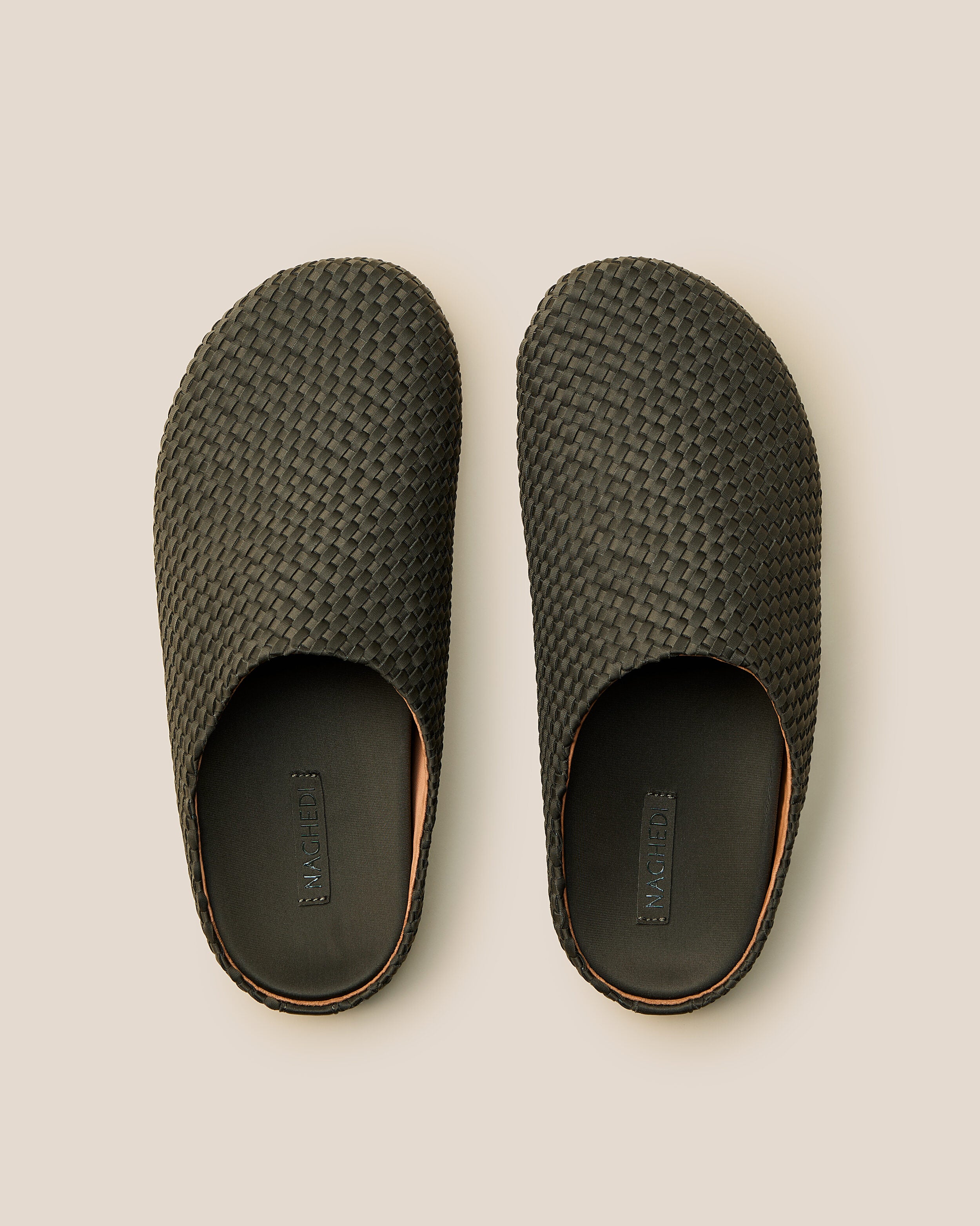 Top view of pair of The Hudson Clog in Olive showing the padded, molded neoprene footbed.