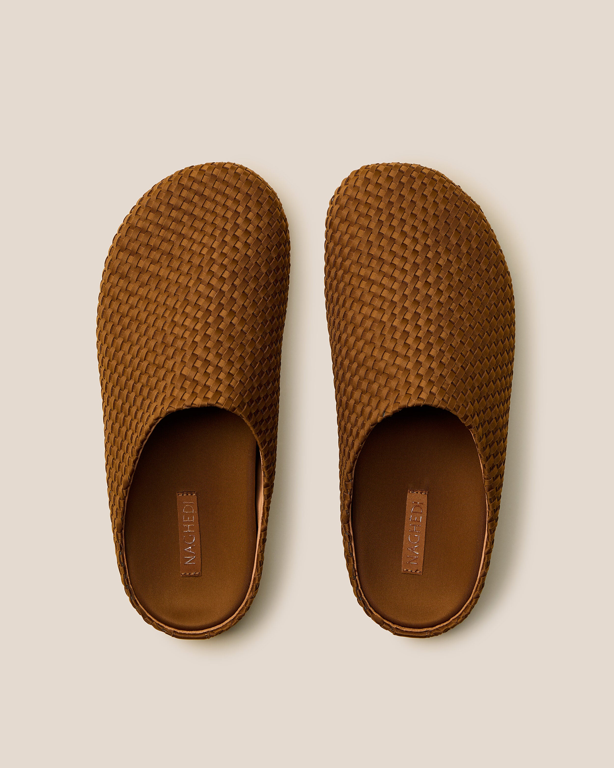Top view of pair of The Hudson Clog in Teak showing the padded, molded neoprene footbed.