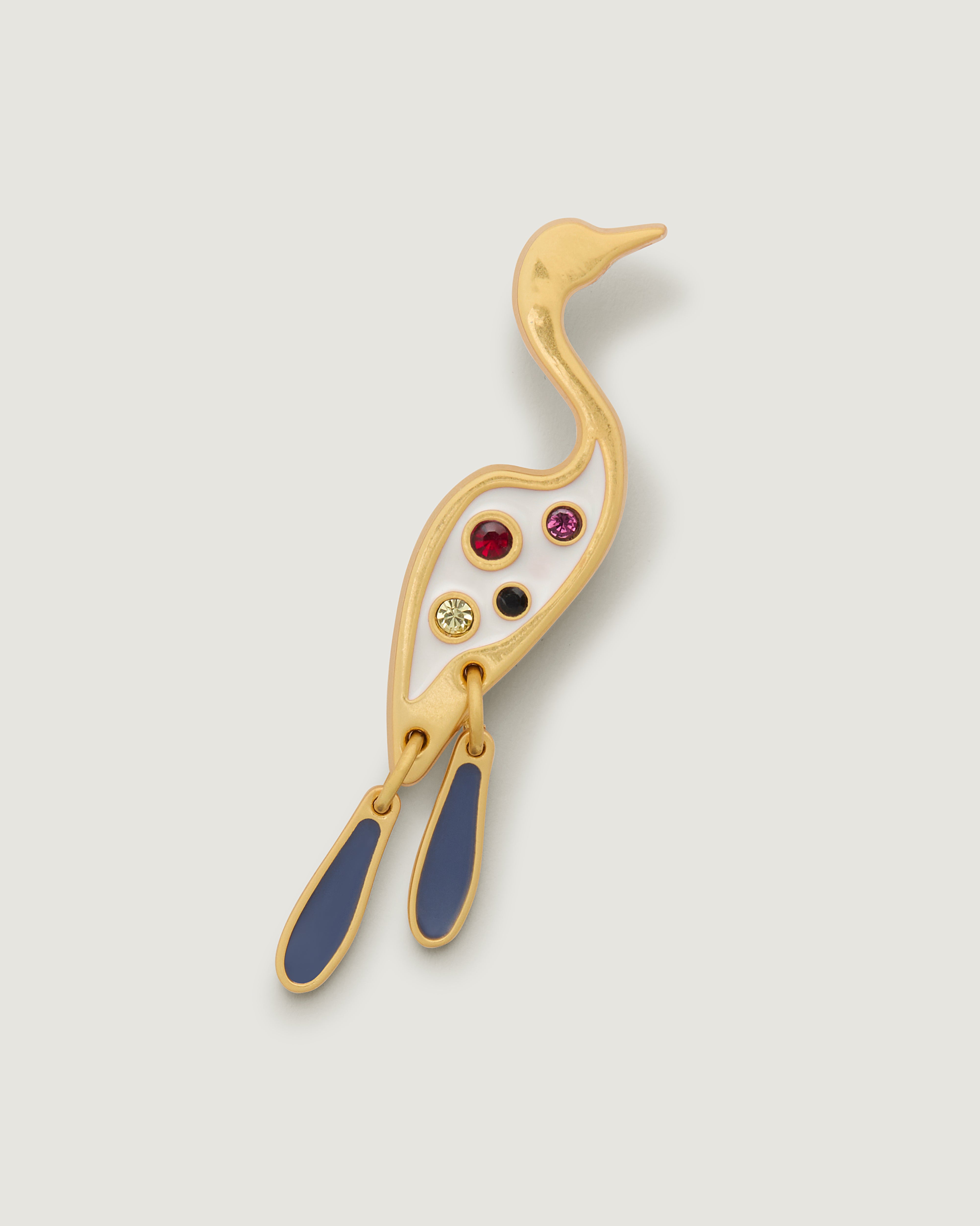 Brushed gold with enamel Bird of Paradise bag charm featuring colored gem stones.